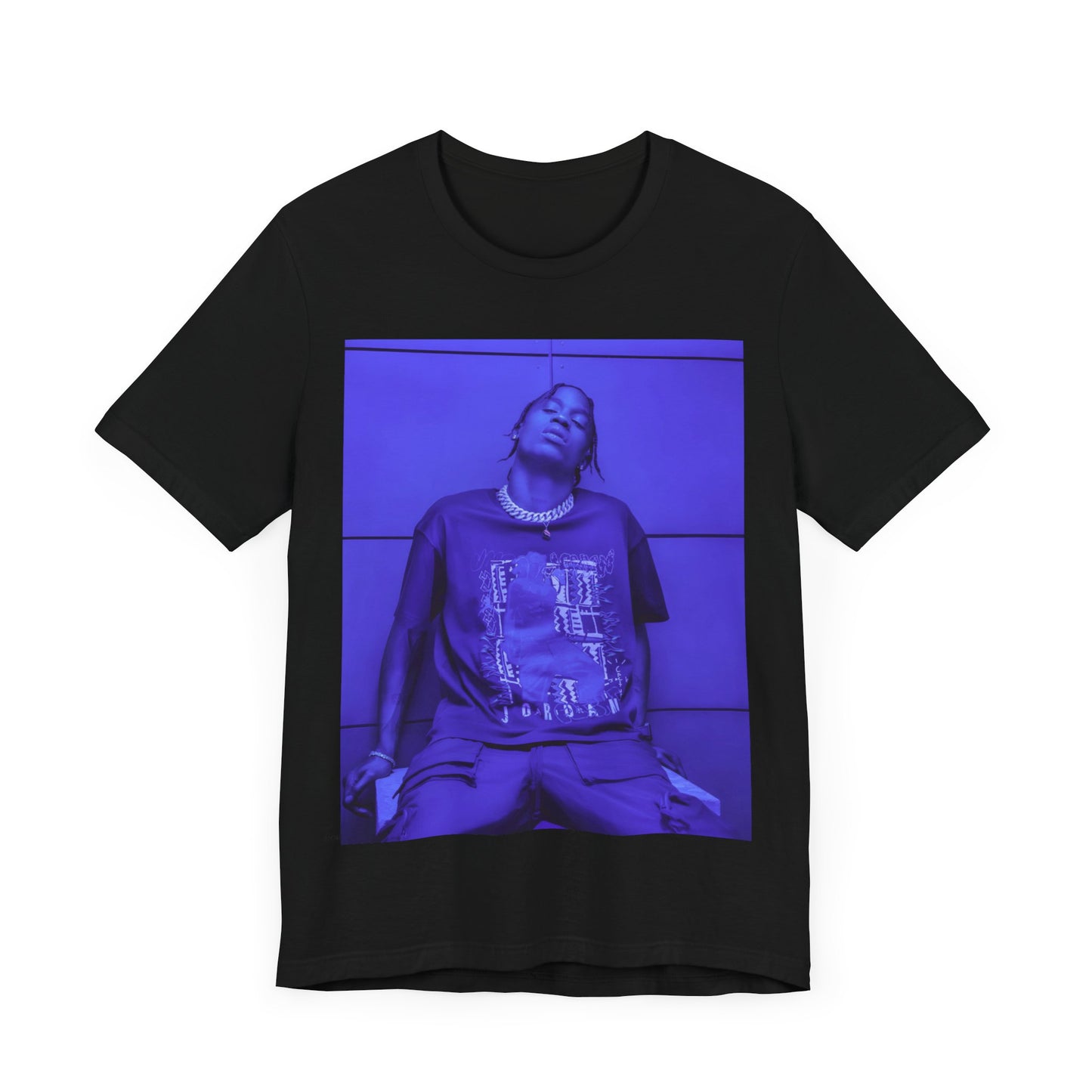 A black graphic t-shirt featuring a timeless trap star graphic of Travis Scott.