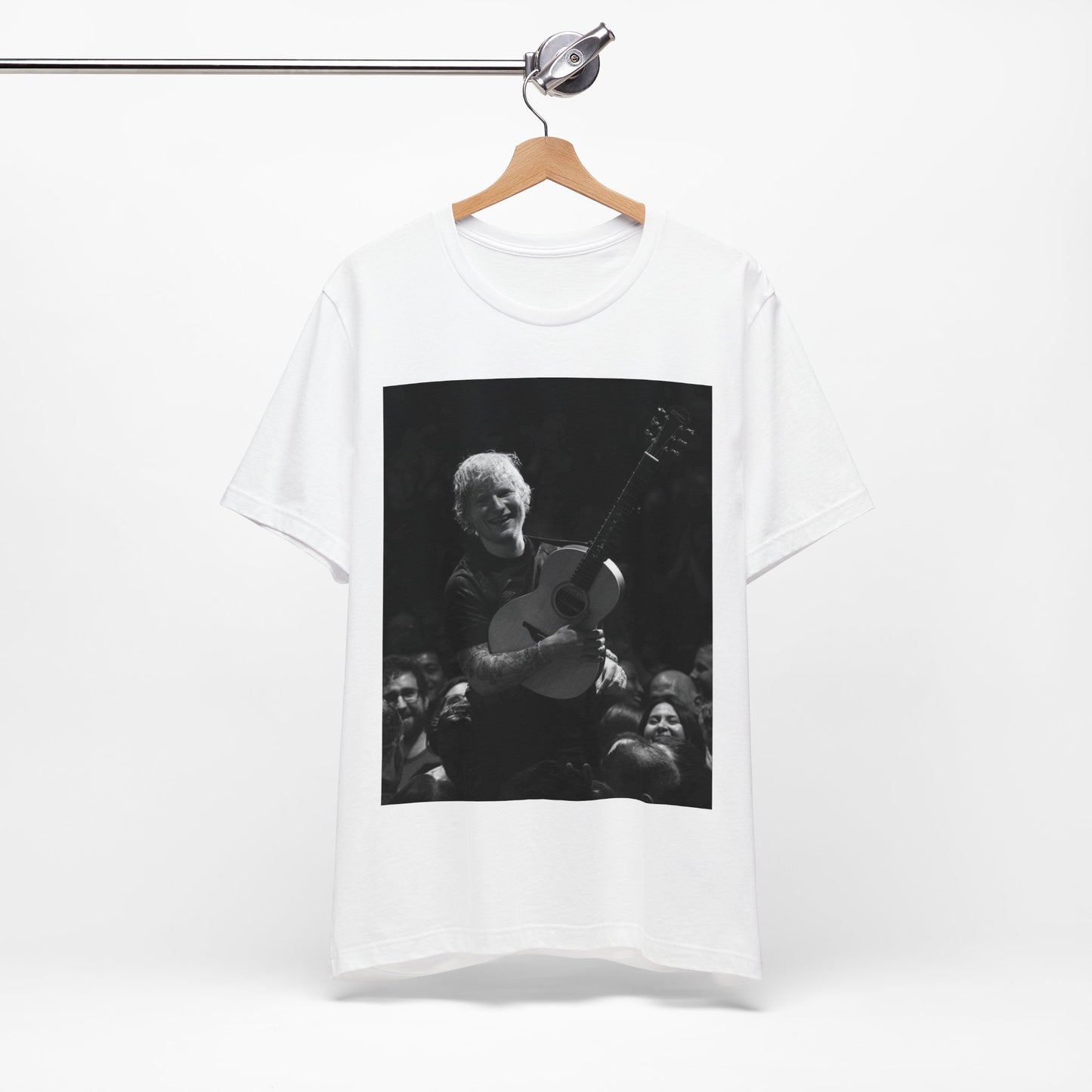 A black graphic t-shirt featuring a photo of Ed Sheeran performing live with his guitar.