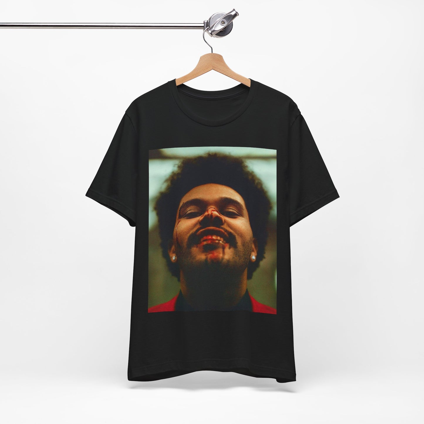 A black graphic t-shirt featuring the album cover art for The Weeknd's 'After Hours'.