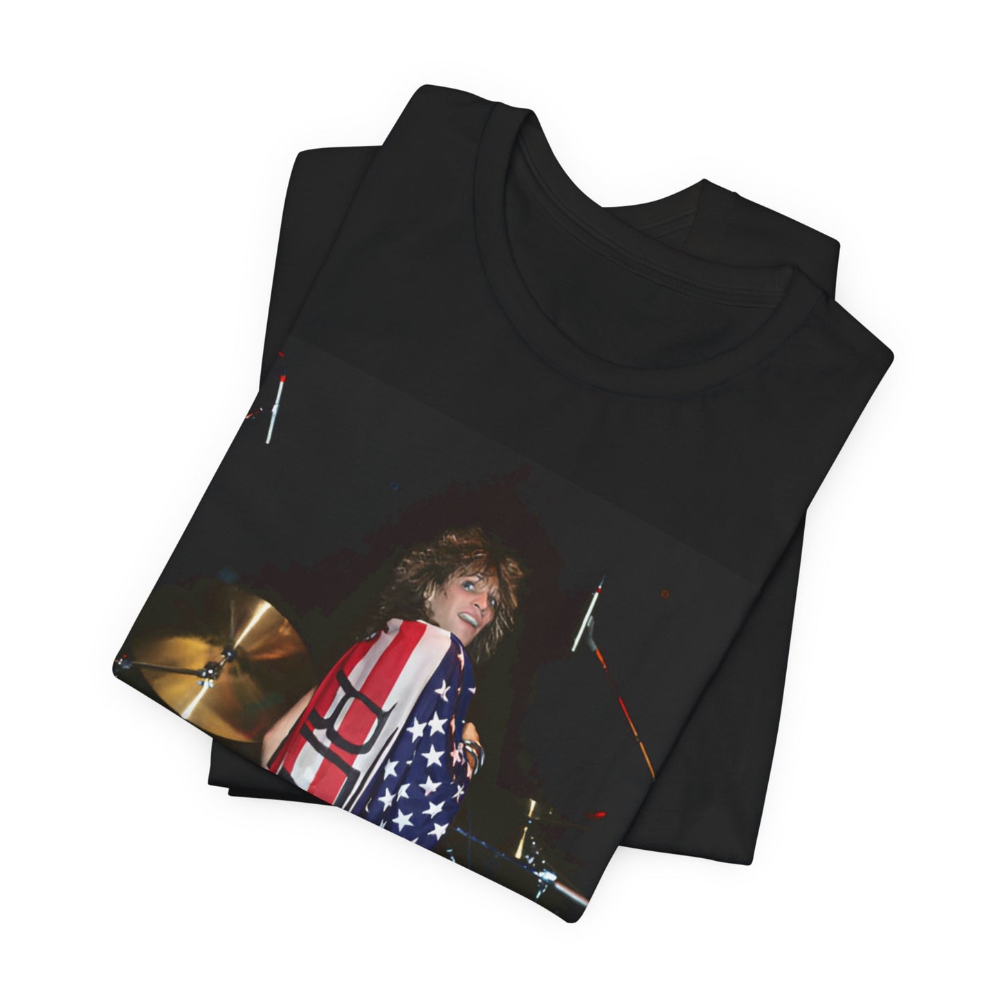 A black graphic t-shirt featuring a graphic of Bon Jovi performing on stage with an American flag as a backdrop.