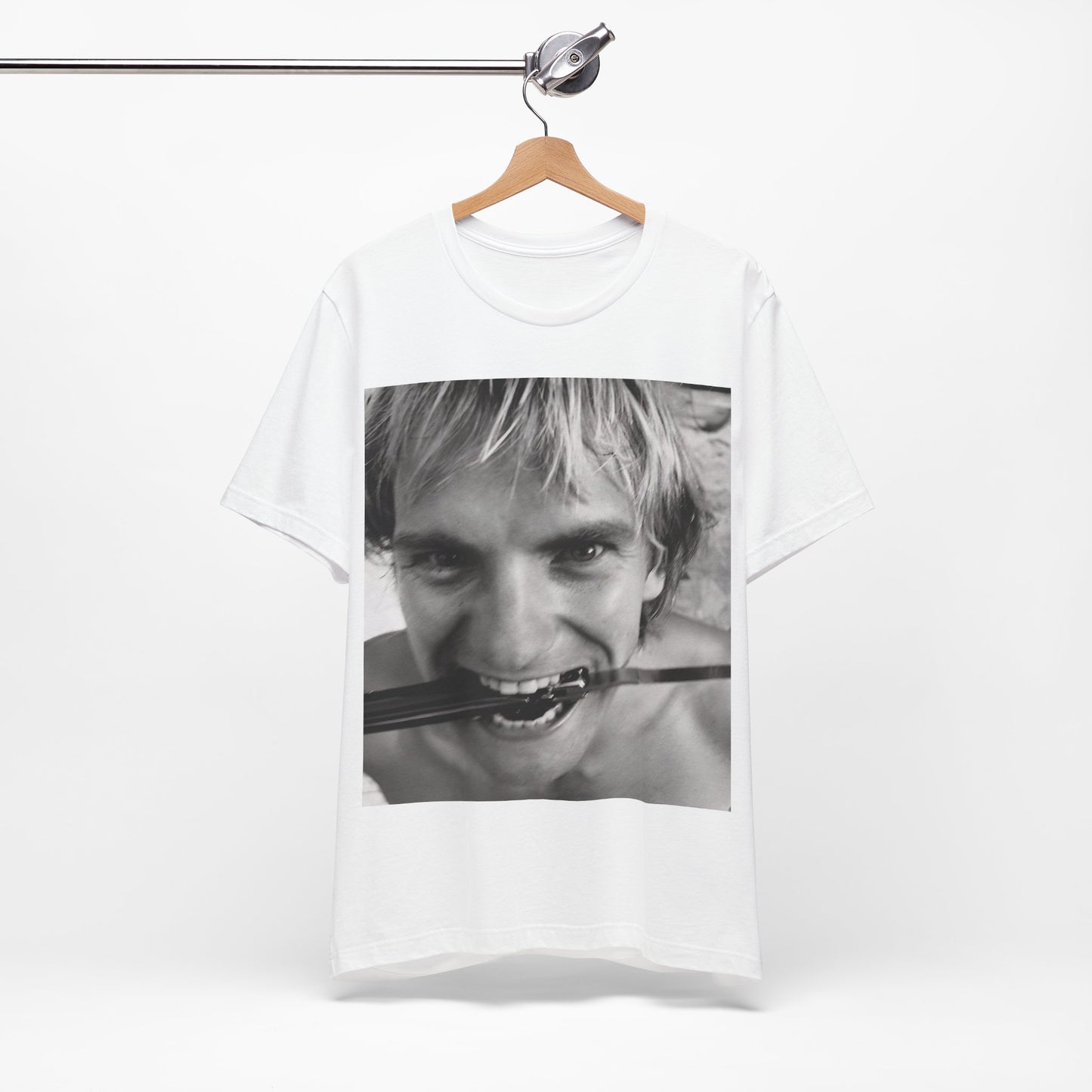 A black graphic t-shirt featuring a wild photo graphic of Sting.