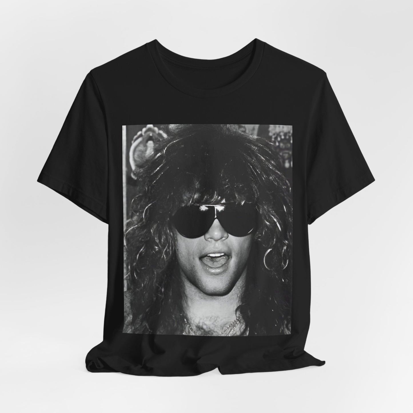 A black graphic t-shirt featuring a graphic or photo of Bon Jovi in a backstage setting.