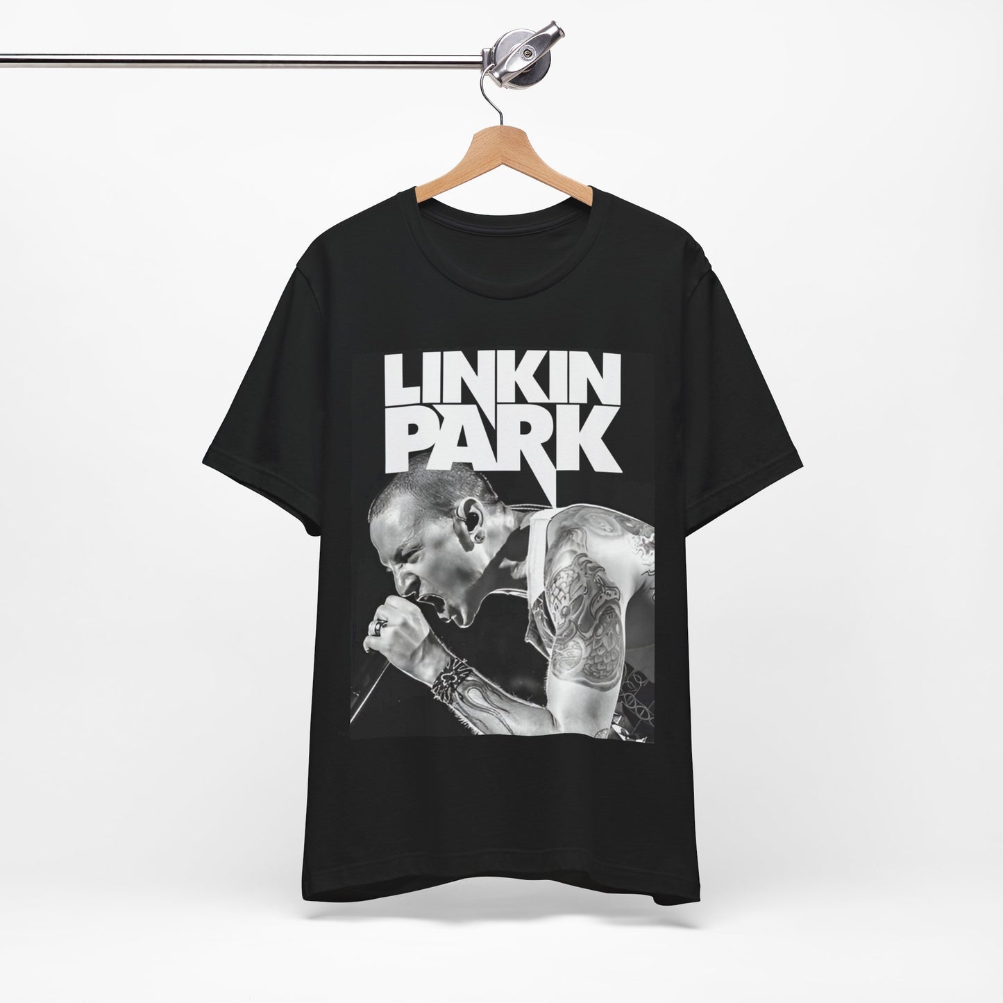A black graphic t-shirt featuring a black and white graphic or photo portrait of Chester Bennington from Linkin Park.