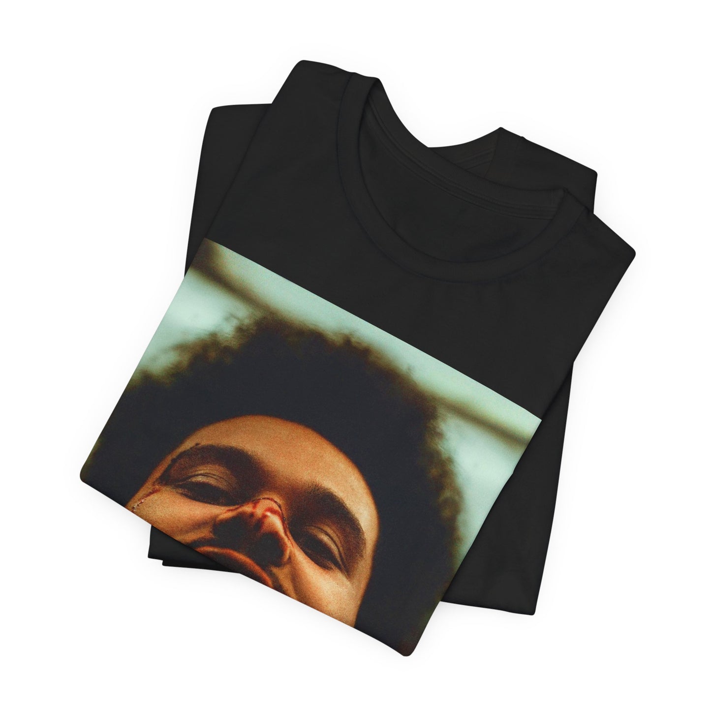 A black graphic t-shirt featuring the album cover art for The Weeknd's 'After Hours'.