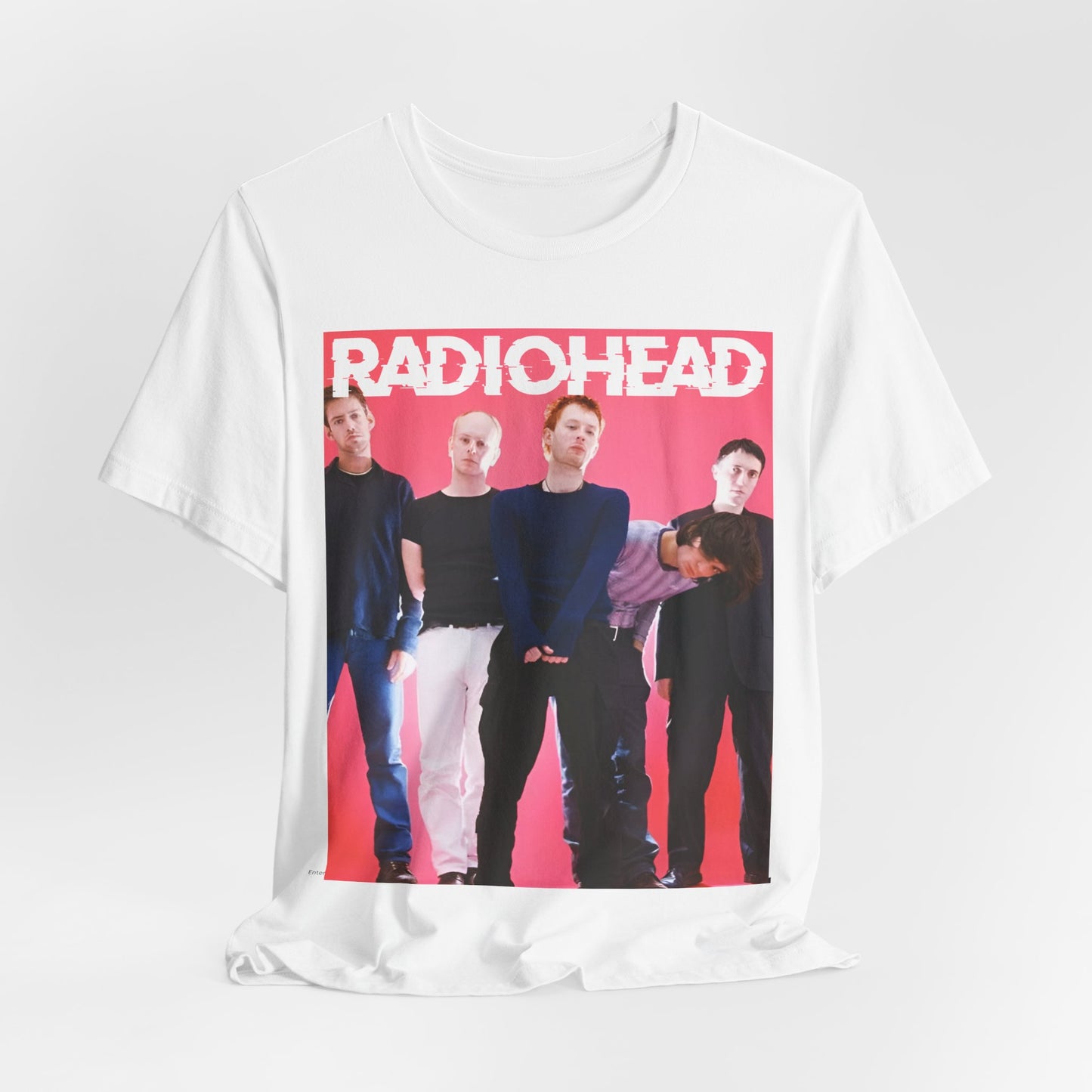A black graphic t-shirt featuring a 90s alternative aesthetic graphic of Radiohead.