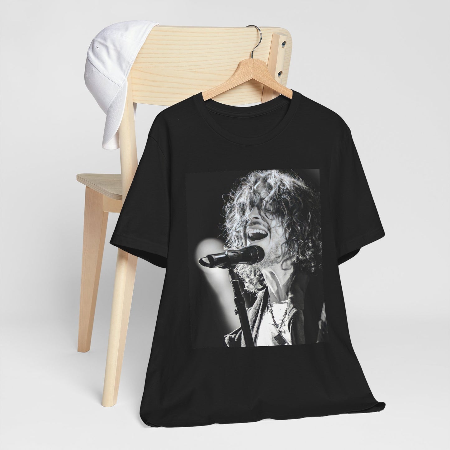 A black graphic t-shirt featuring a graphic related to Chris Cornell's song "Cochise" or Audioslave.