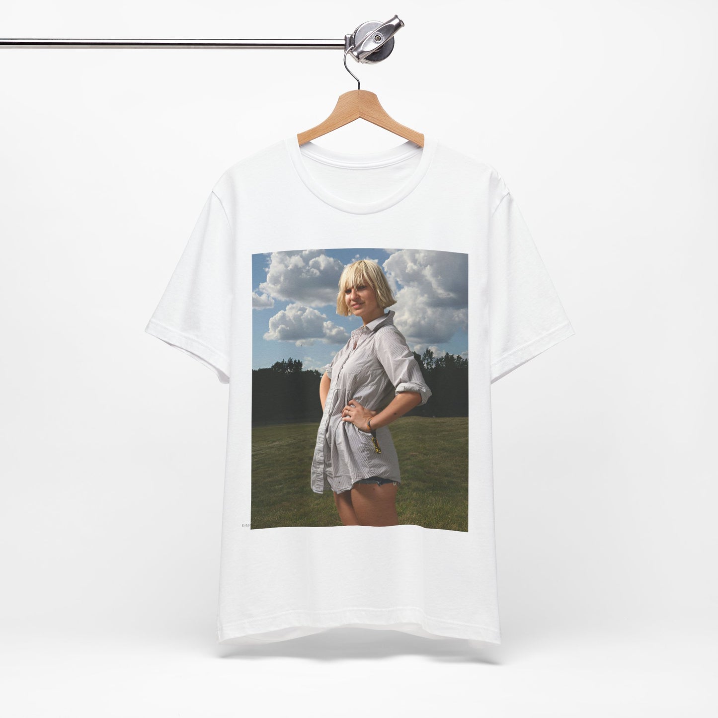A black graphic t-shirt featuring a bold graphic of Sia as a pop superstar.
