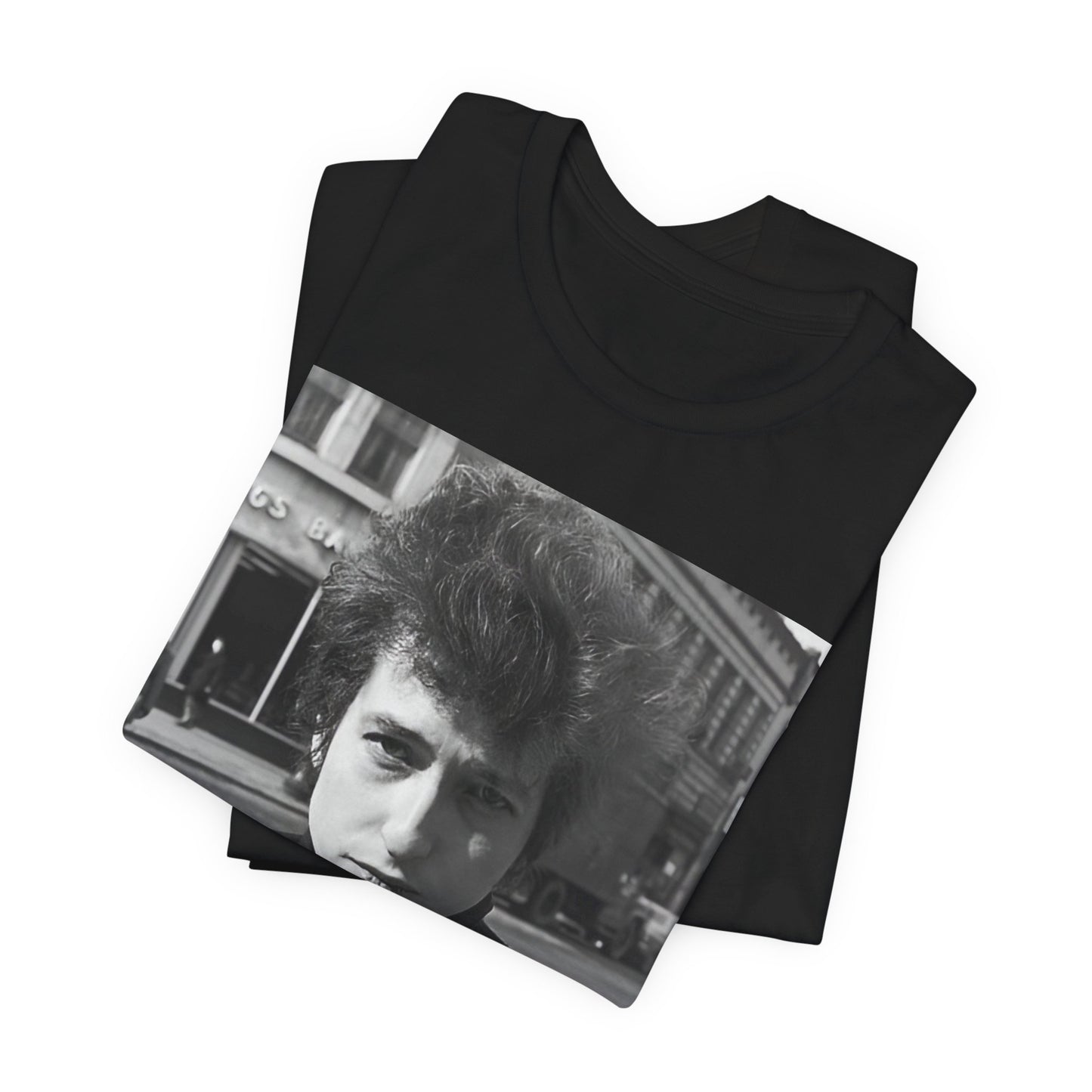 A black graphic t-shirt featuring a 60s black and white photo portrait of Bob Dylan.