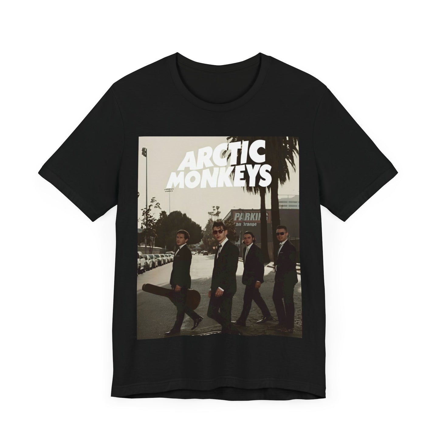 A black graphic t-shirt featuring Arctic Monkeys in a pose or setting similar to the iconic 'Abbey Road' album cover.