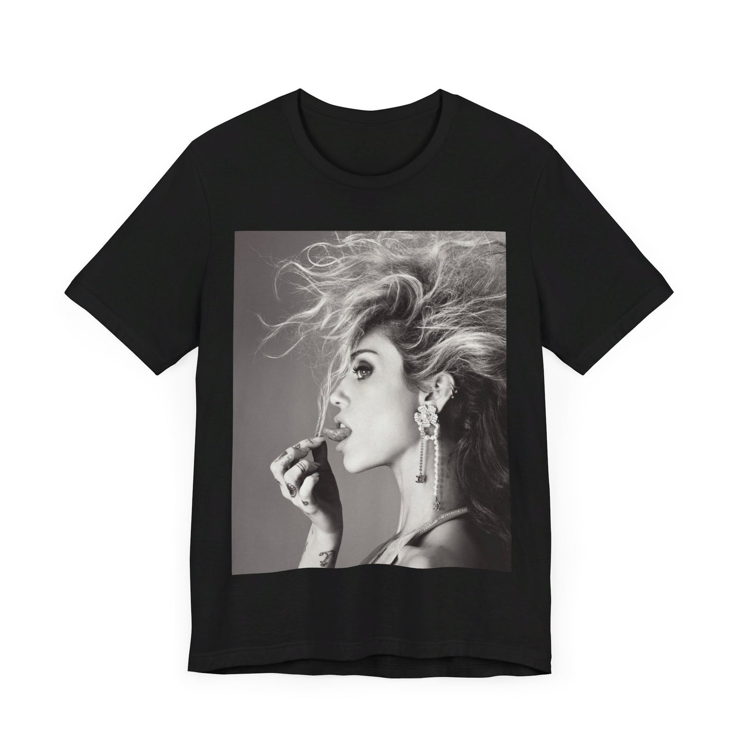 A black graphic t-shirt featuring a graphic of Miley Cyrus as a grunge rockstar.