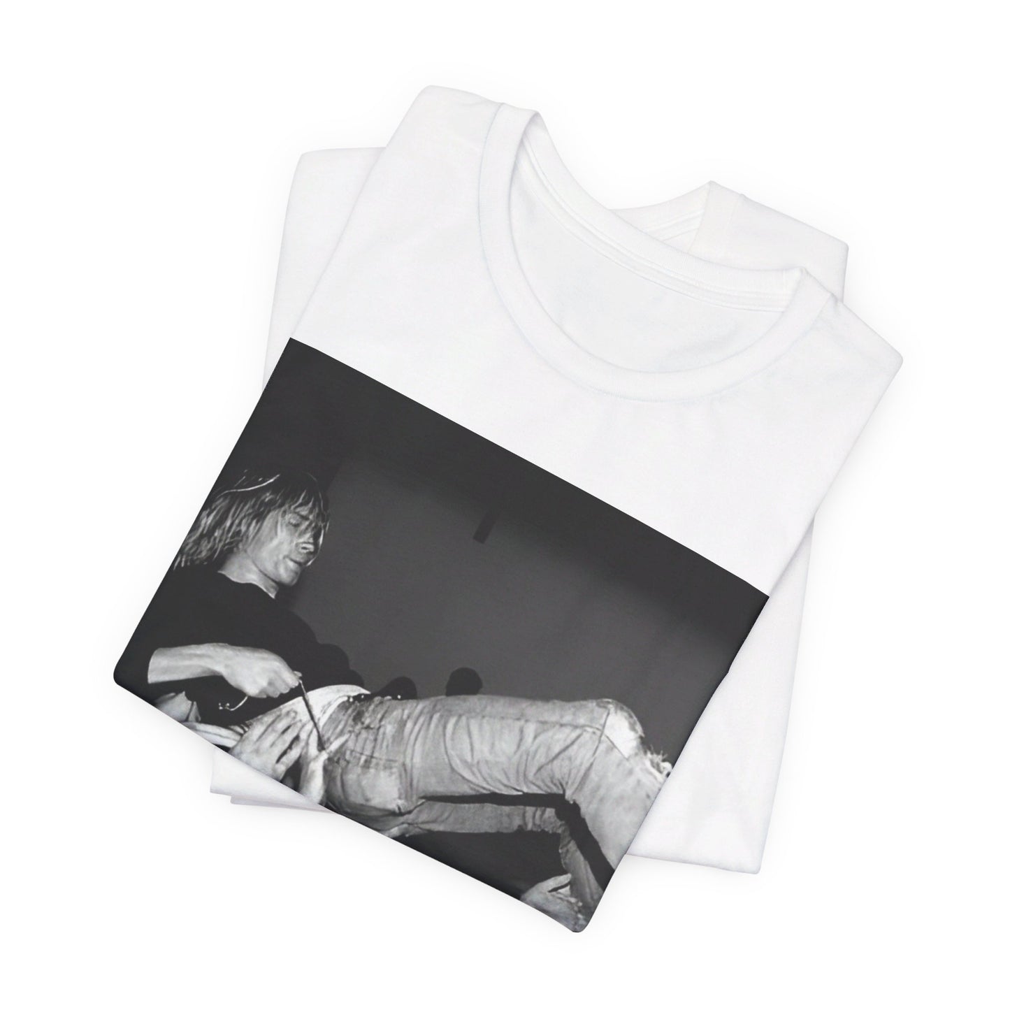 A black graphic t-shirt featuring a 90s graphic or photo of Kurt Cobain from Nirvana stage diving.
