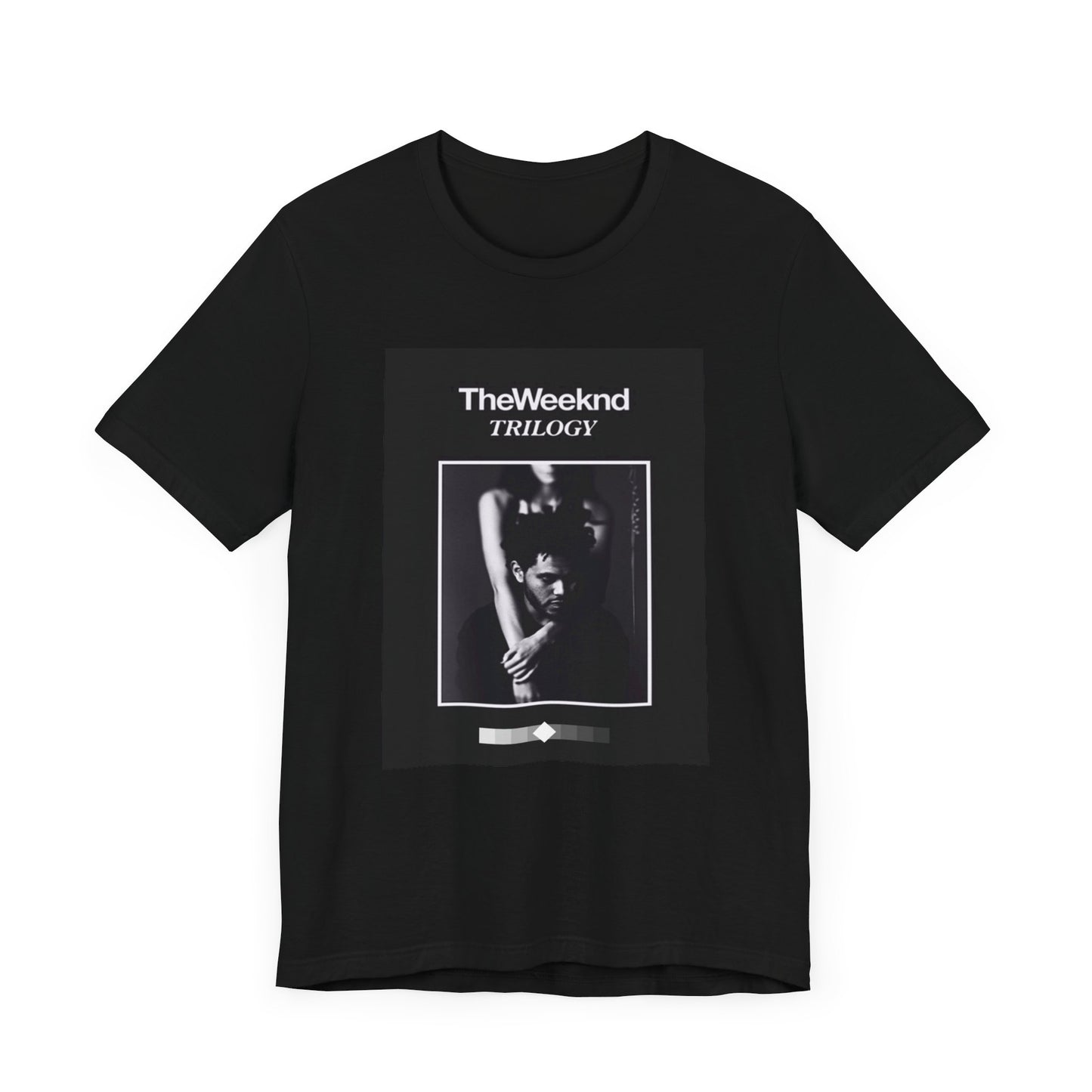 A black graphic t-shirt featuring a graphic related to The Weeknd's 'Trilogy' album.