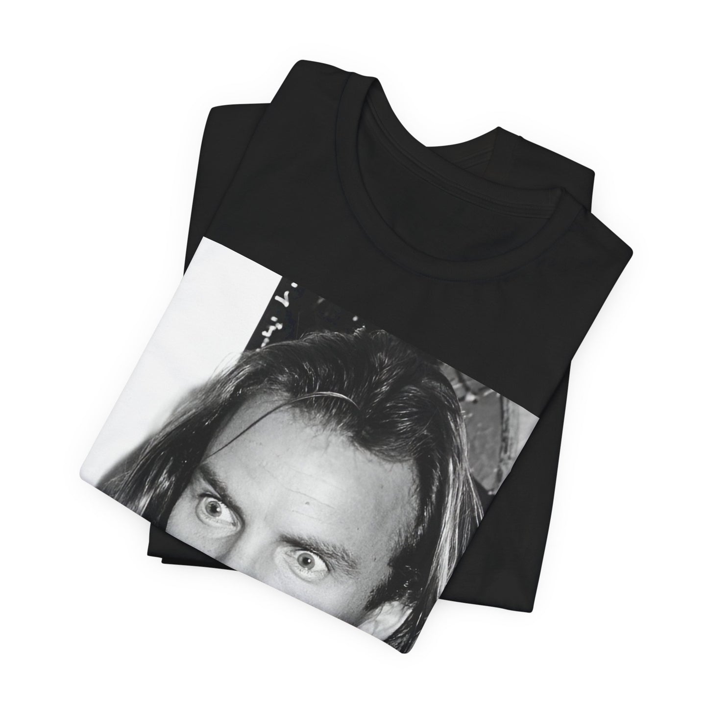 A black graphic t-shirt featuring a retro graphic related to Sting's 'Synchronicity' album era.