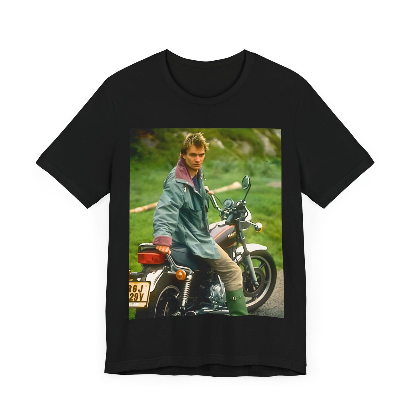 A black graphic t-shirt featuring a graphic of Sting from The Police with a motorcycle theme.