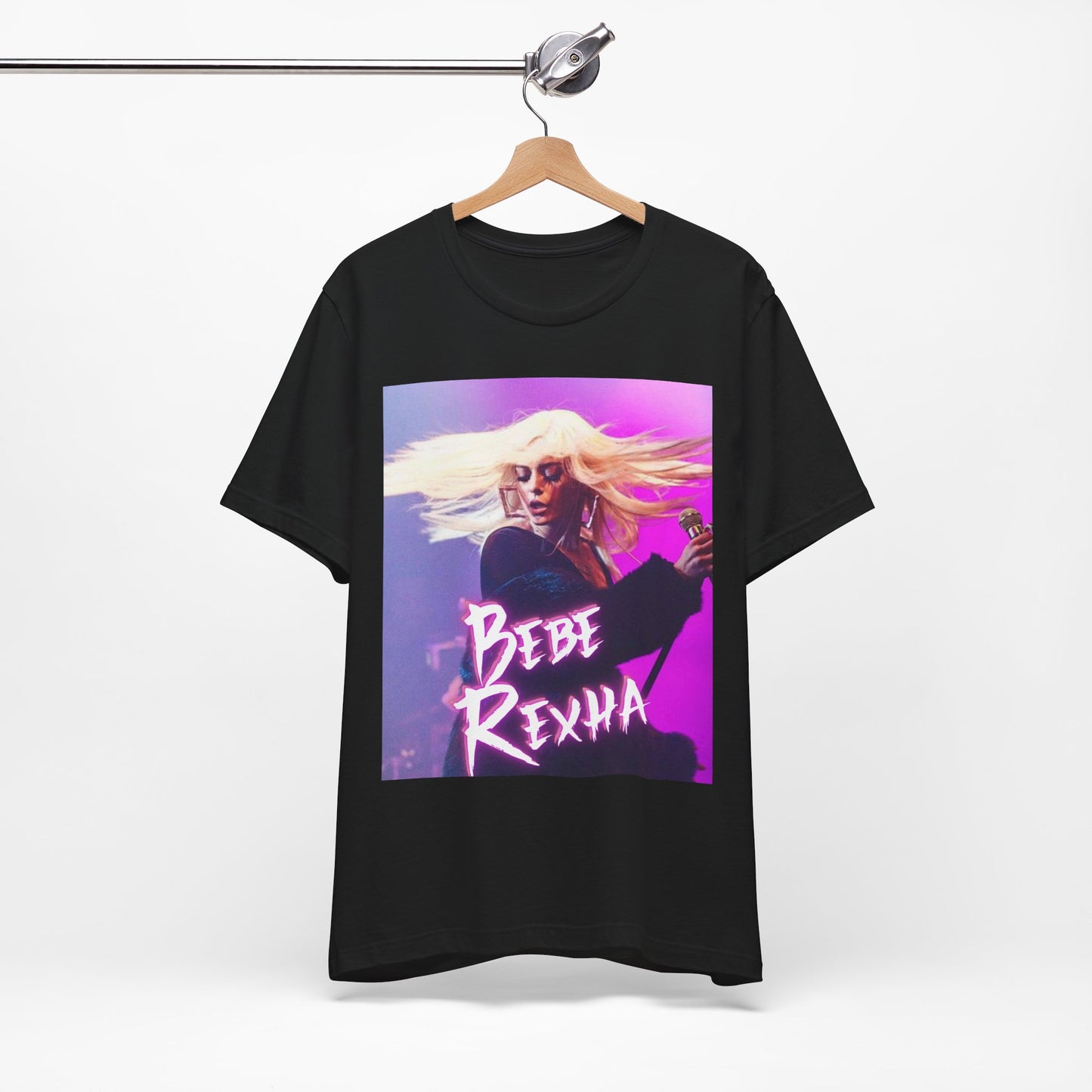 A black graphic t-shirt featuring a dynamic graphic or photo of Bebe Rexha performing live in concert.