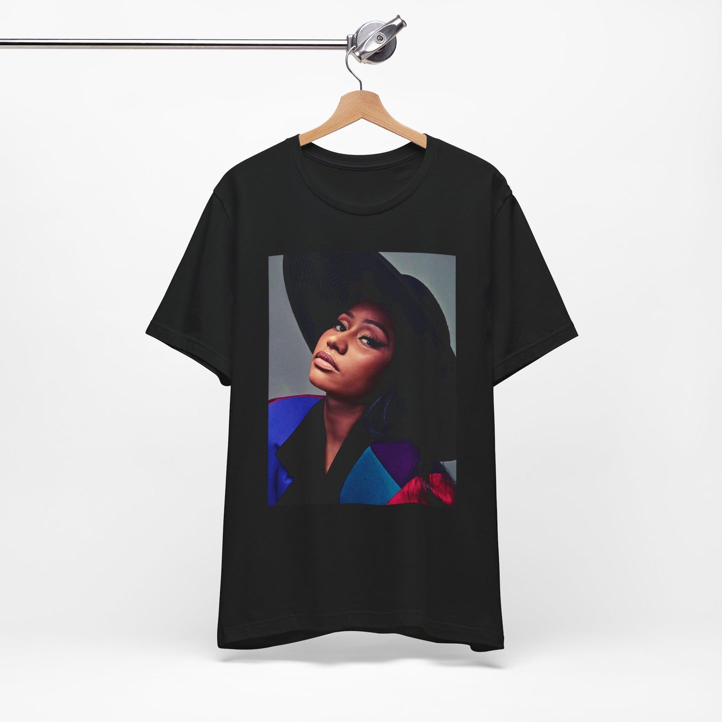 A black graphic t-shirt featuring a graphic of Nicki Minaj as a streetwear icon.