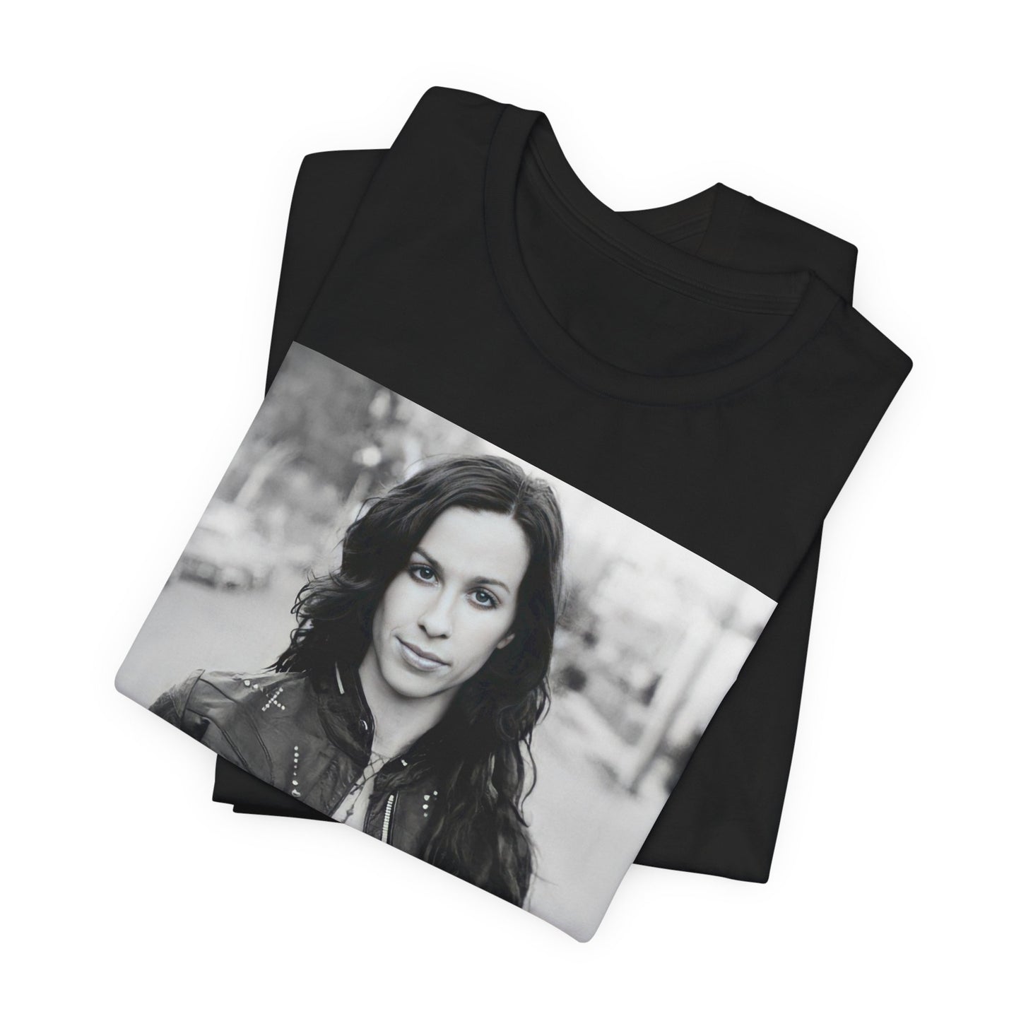 A black graphic t-shirt featuring a black and white photo of Alanis Morissette from 1998, showing her with a poised or thoughtful expression.