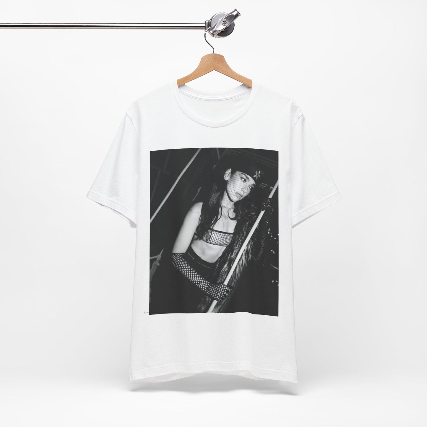 A black graphic t-shirt featuring a black and white, monochrome graphic or portrait of Dua Lipa.
