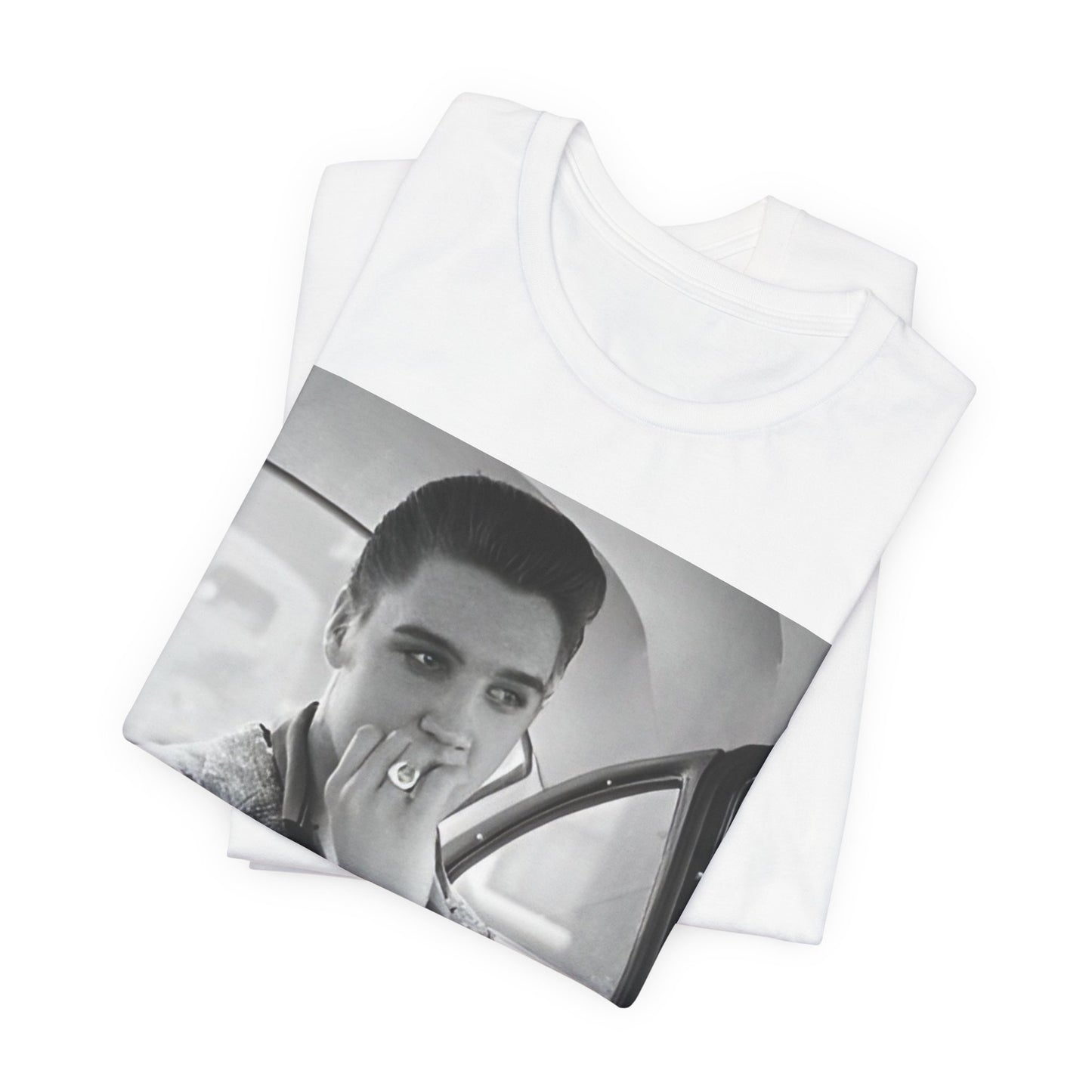 A black graphic t-shirt featuring a classic 50s era graphic of Elvis Presley.