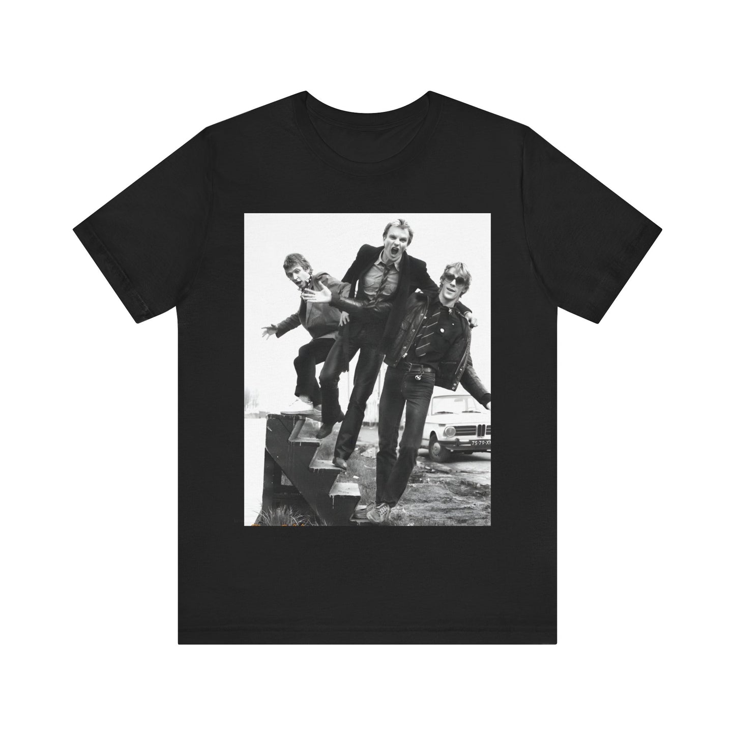 A black graphic t-shirt featuring an early days reggae rock graphic of The Police.