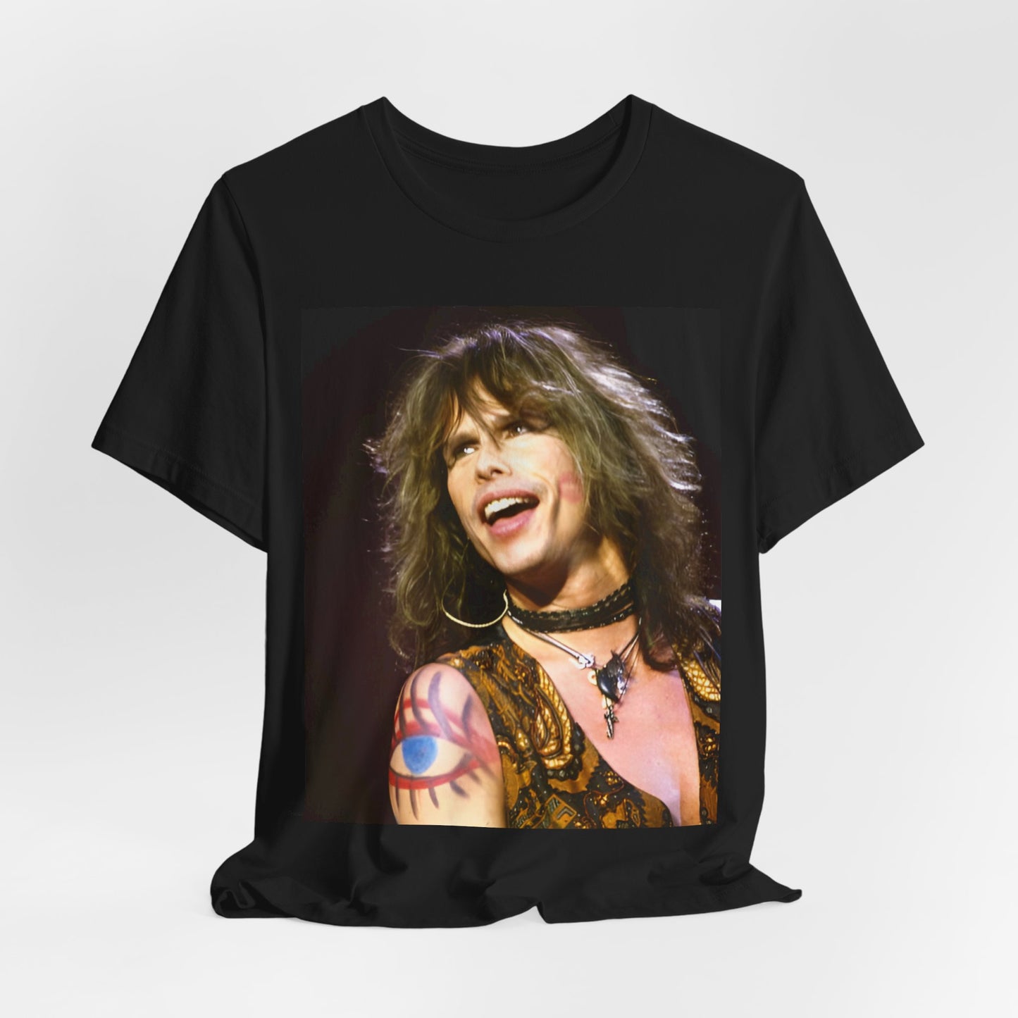 A black graphic t-shirt featuring a design related to Aerosmith's 'Nine Lives' tour from the 1990s, likely incorporating album art elements or band visuals from that era.