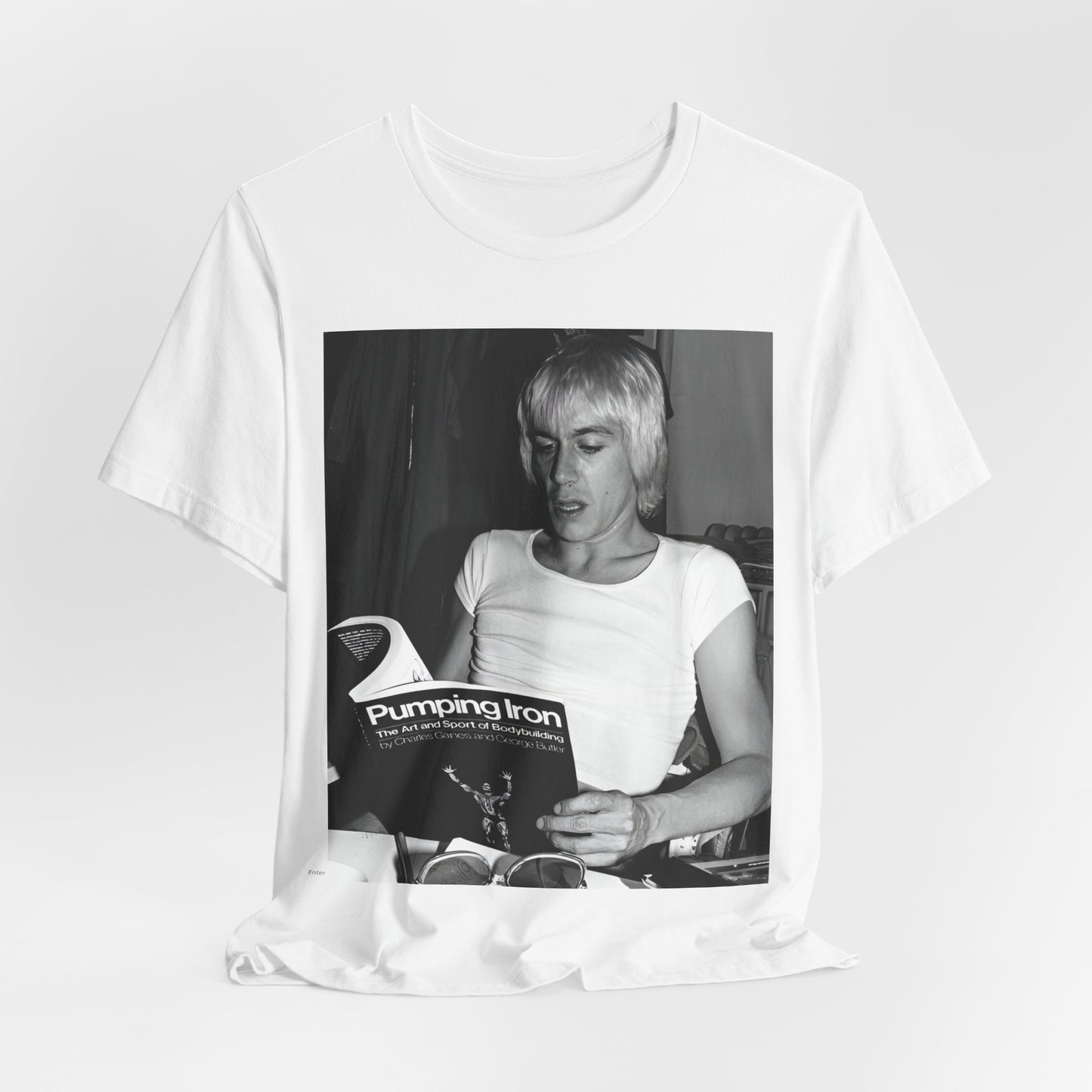 A black graphic t-shirt featuring a 70s classic photo of Iggy Pop and The Stooges.