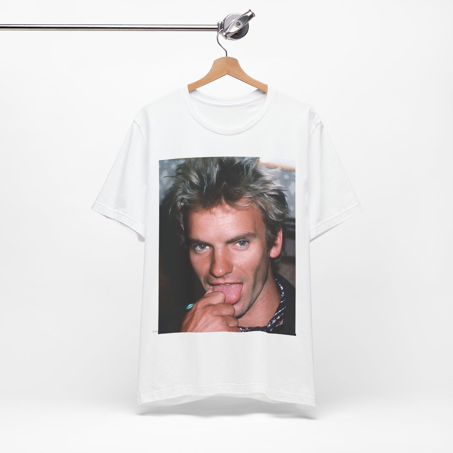 A black graphic t-shirt featuring an 80s new wave aesthetic graphic of Sting.