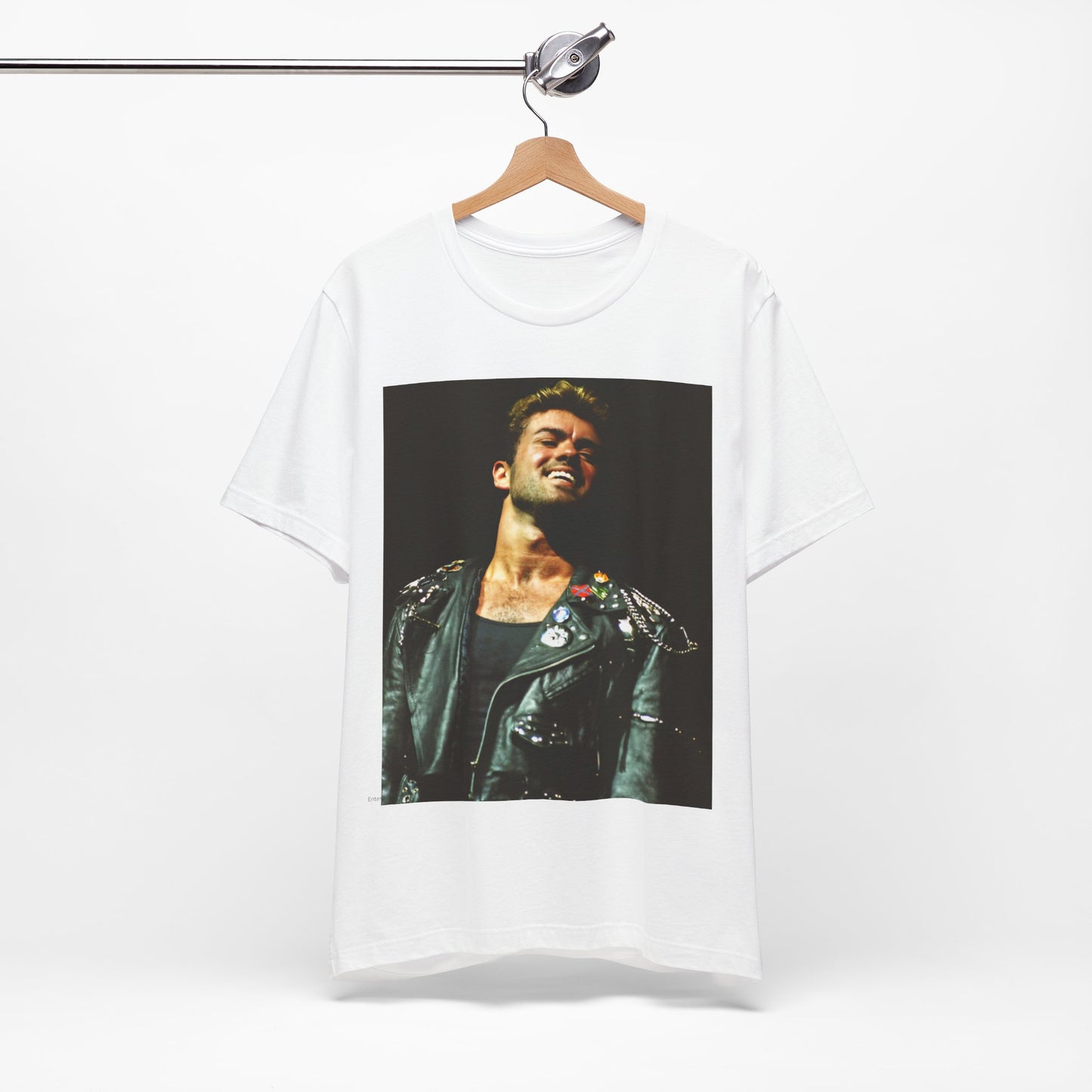 A black graphic t-shirt featuring a graphic related to George Michael's 'Careless Whisper' song or era.