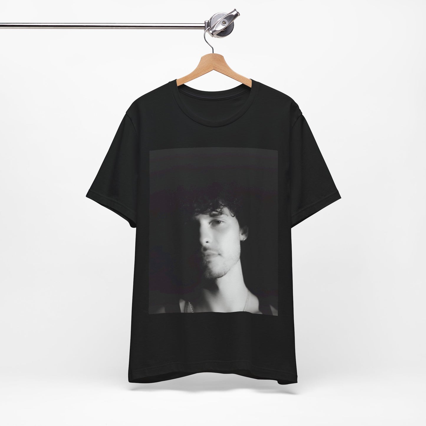 A black graphic t-shirt featuring a black and white portrait photo of Shawn Mendes.