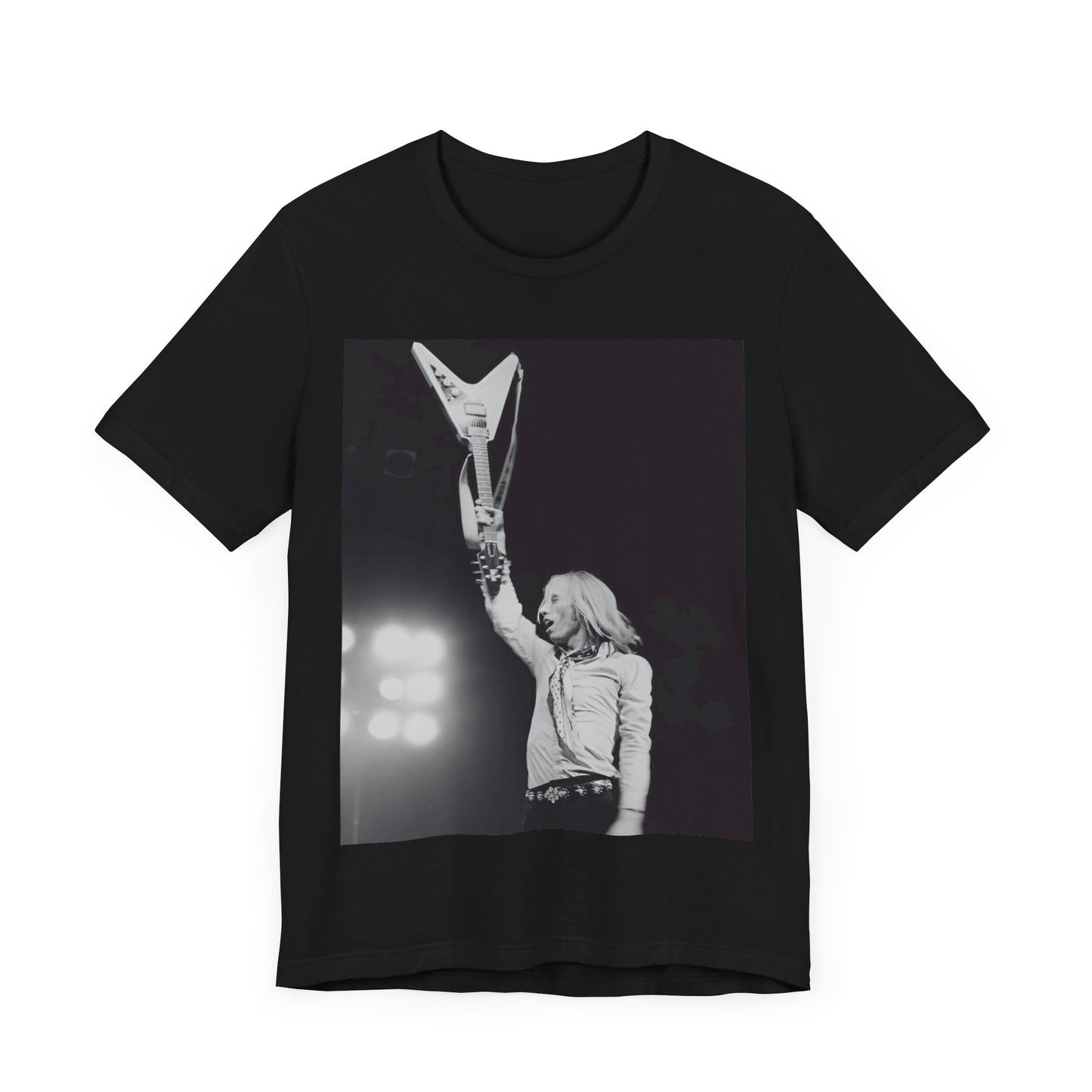 A black graphic t-shirt featuring a graphic or photo of Tom Petty playing guitar on stage.