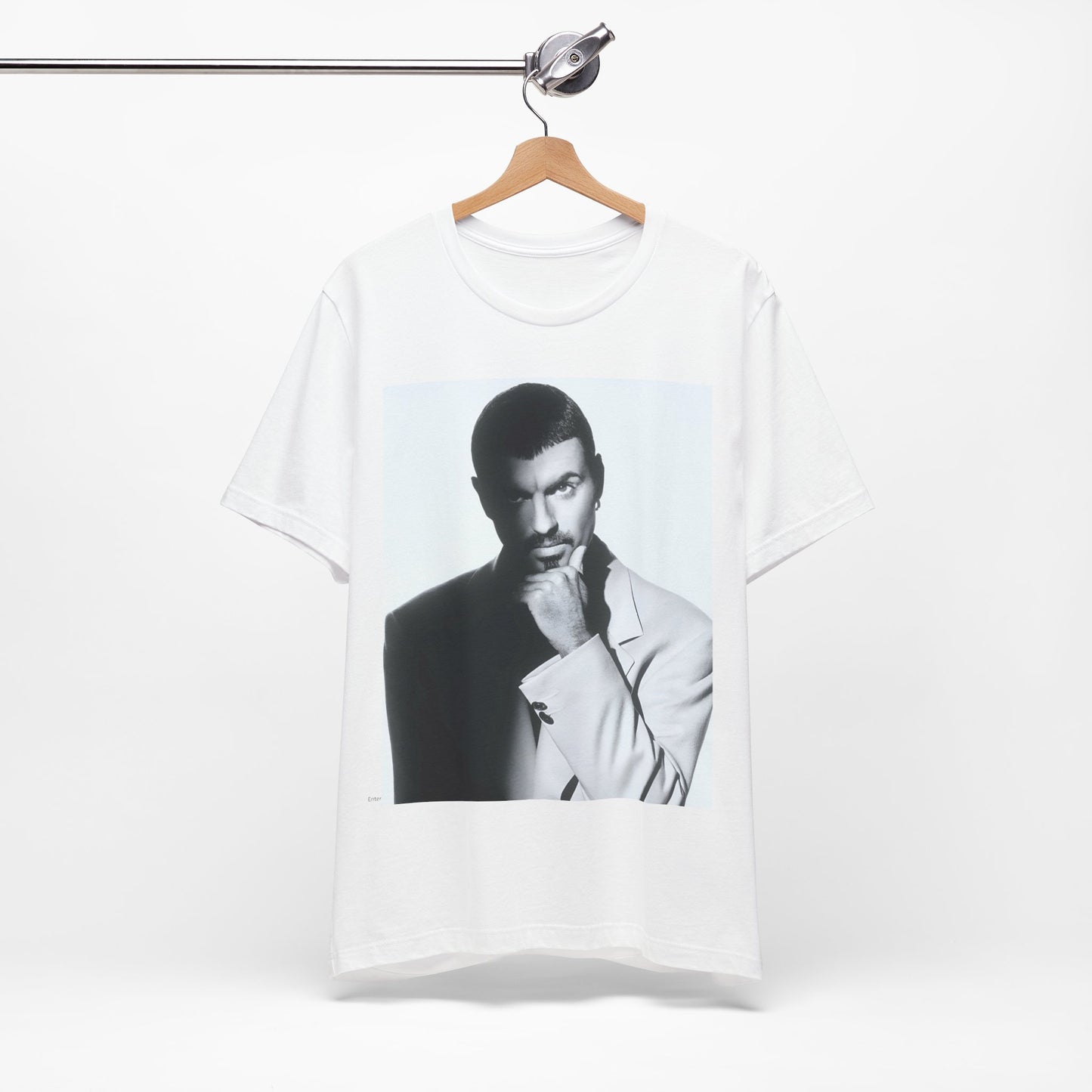 A black graphic t-shirt featuring a 90s aesthetic graphic of George Michael.