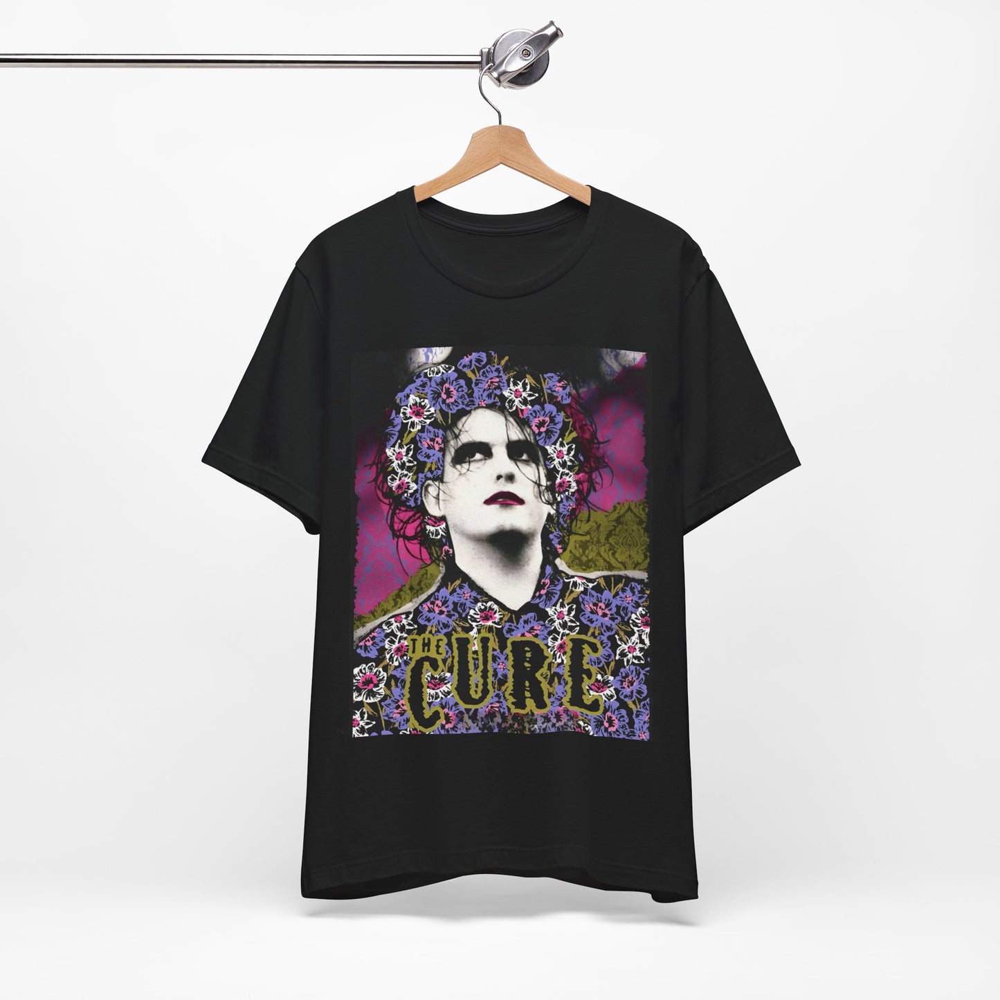 A black graphic t-shirt featuring a retro rock aesthetic pop art graphic of The Cure.
