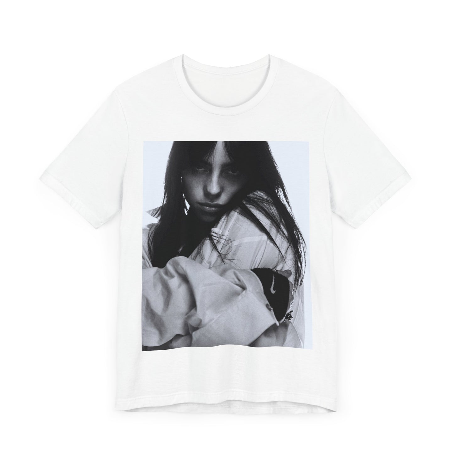 Billie Eilish posing in her signature oversized designer streetwear, printed on a graphic t-shirt.