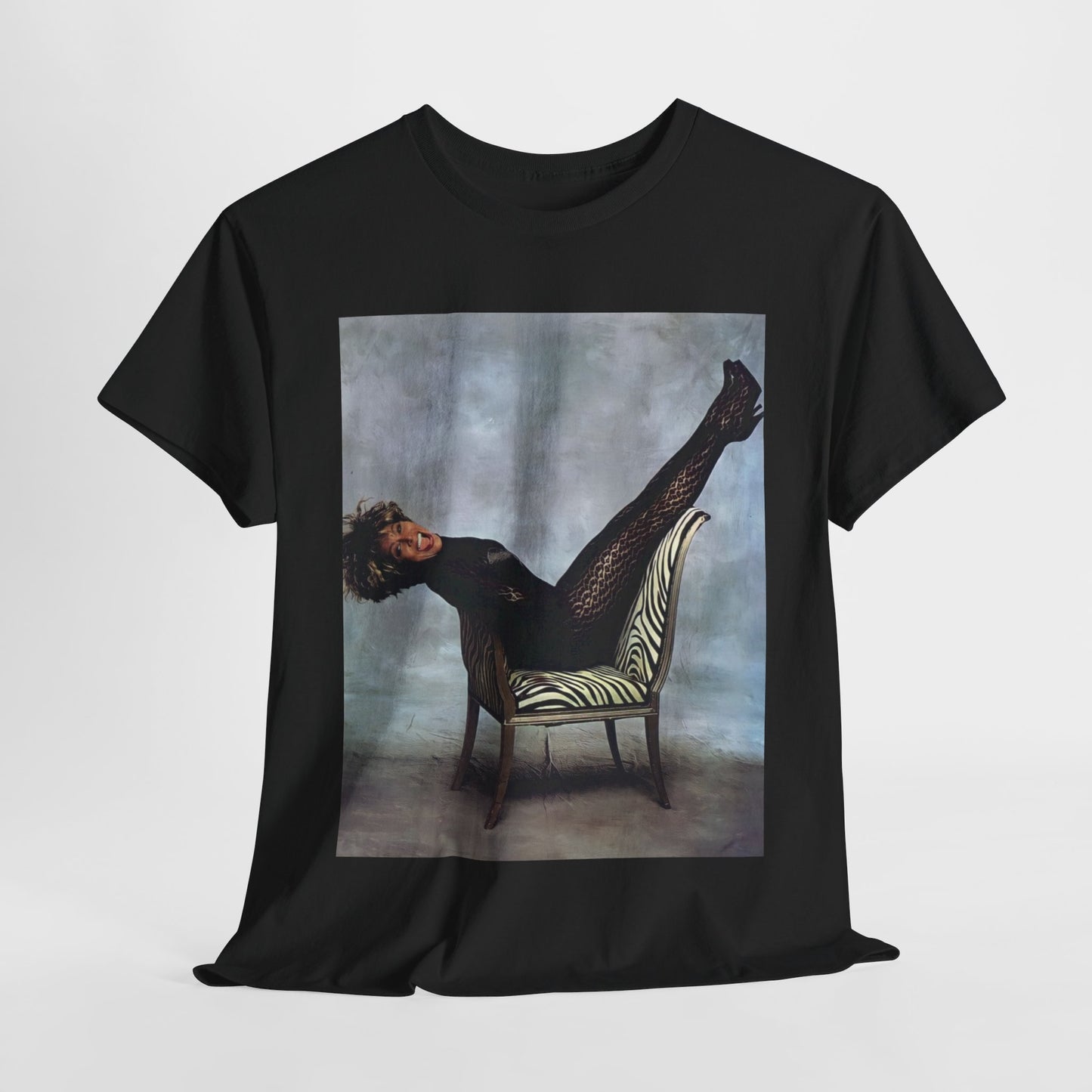 A black graphic t-shirt featuring a bold rock superstar graphic of Tina Turner.