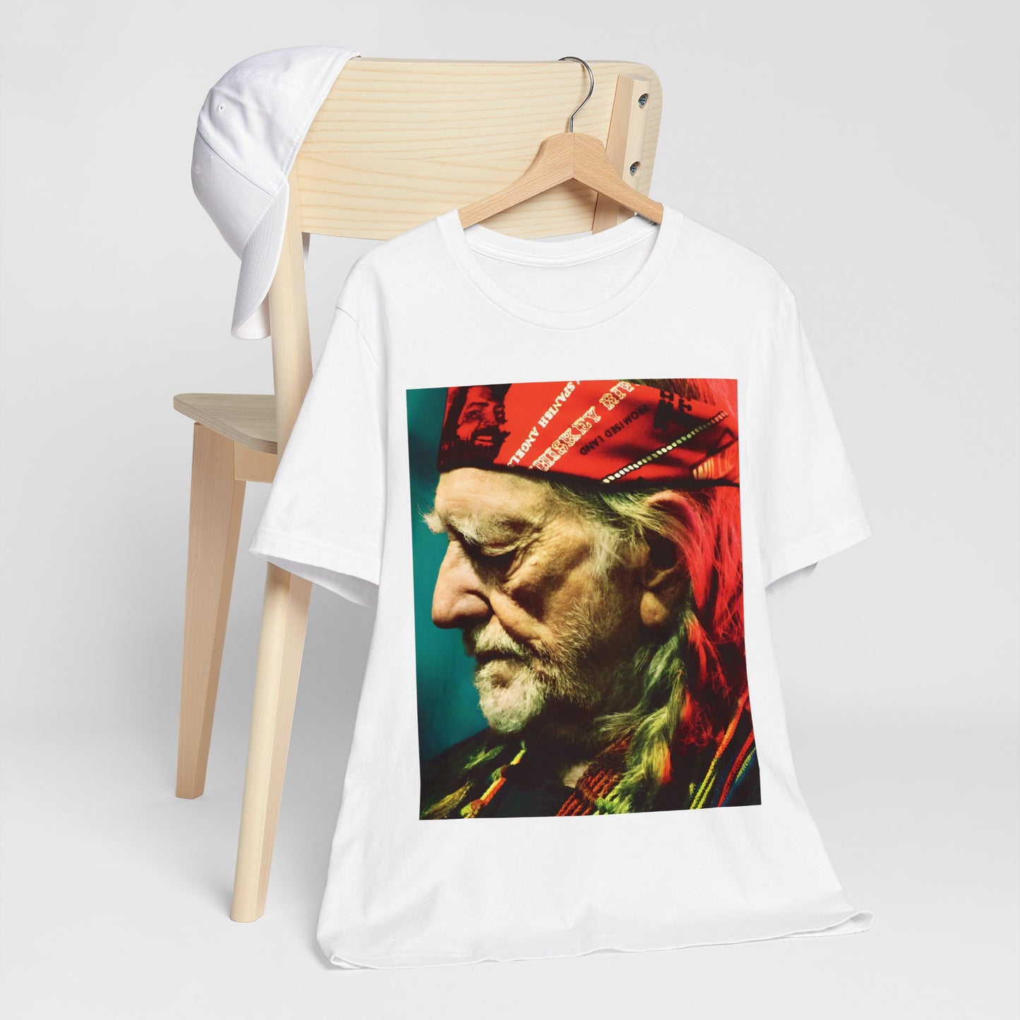 A black graphic t-shirt featuring a graphic related to Willie Nelson's 'Red Headed Stranger' album era.