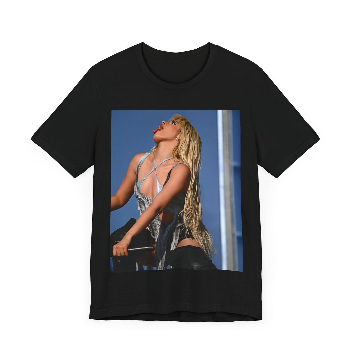 A black graphic t-shirt featuring a dynamic graphic or photo of Camila Cabello performing live on stage.
