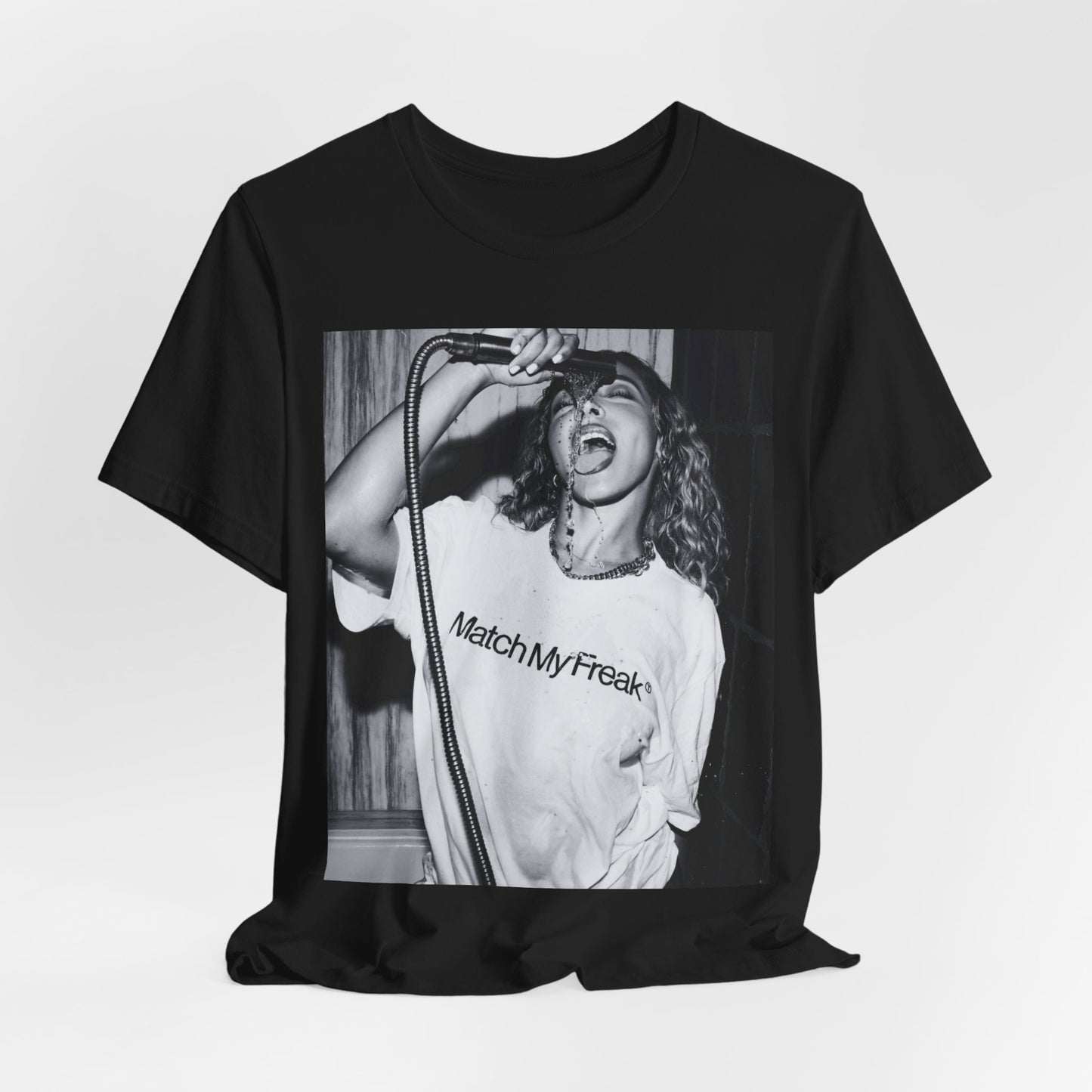 A black graphic t-shirt featuring a black and white graphic related to Tinashe's 'Nasty' era.