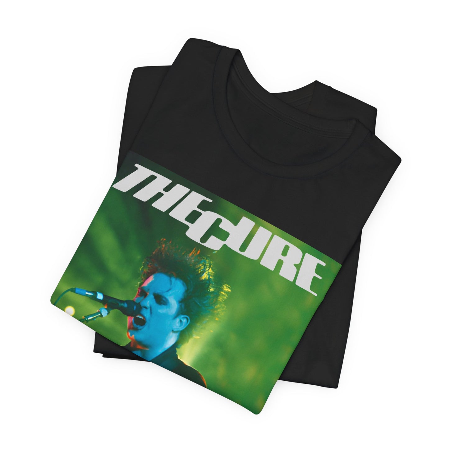 A black graphic t-shirt featuring a graphic or photo of The Cure performing live on stage.