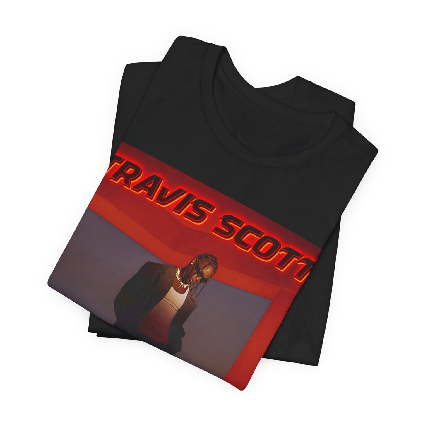 A black graphic t-shirt featuring a graphic of Travis Scott with a dreamy rap soundscape aesthetic.