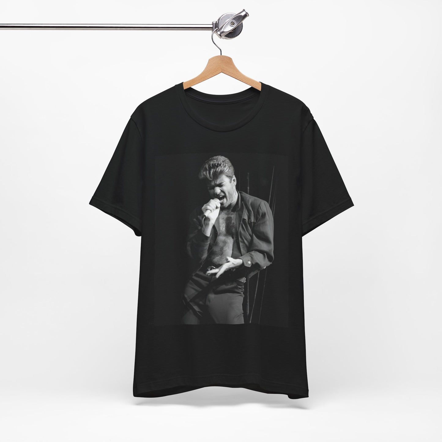 A black graphic t-shirt featuring a glamorous photo or graphic of George Michael performing live.