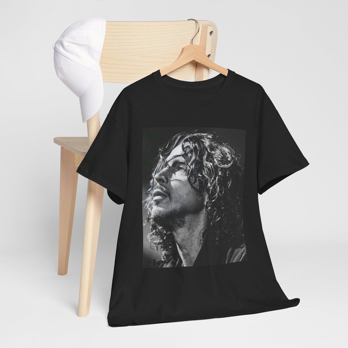 A black graphic t-shirt featuring a black and white graphic or portrait of Chris Cornell as a grunge icon.