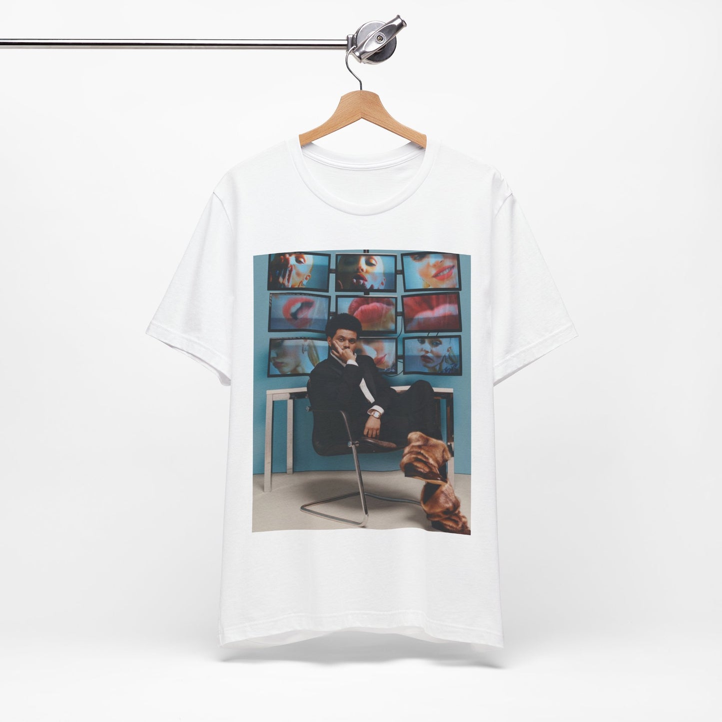 A black graphic t-shirt featuring an aesthetic graphic of The Weeknd.