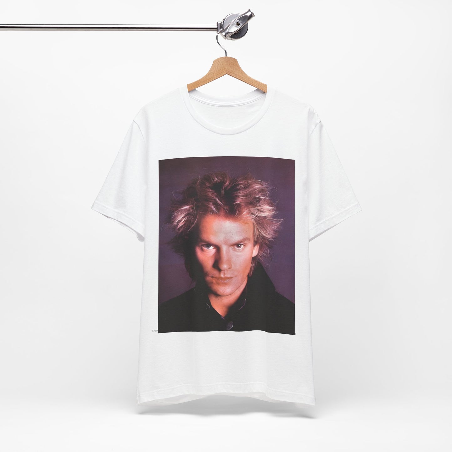 A black graphic t-shirt featuring a graphic related to Sting's 'Every Breath You Take' song or era.