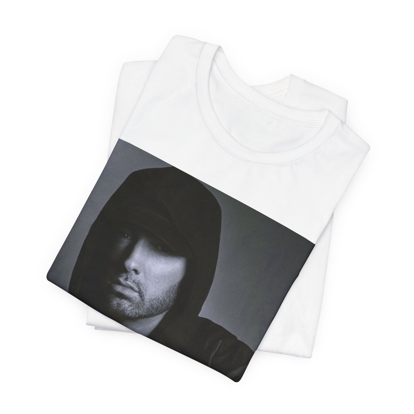 A black graphic t-shirt featuring a black and white, monochrome graphic or photo of Eminem.