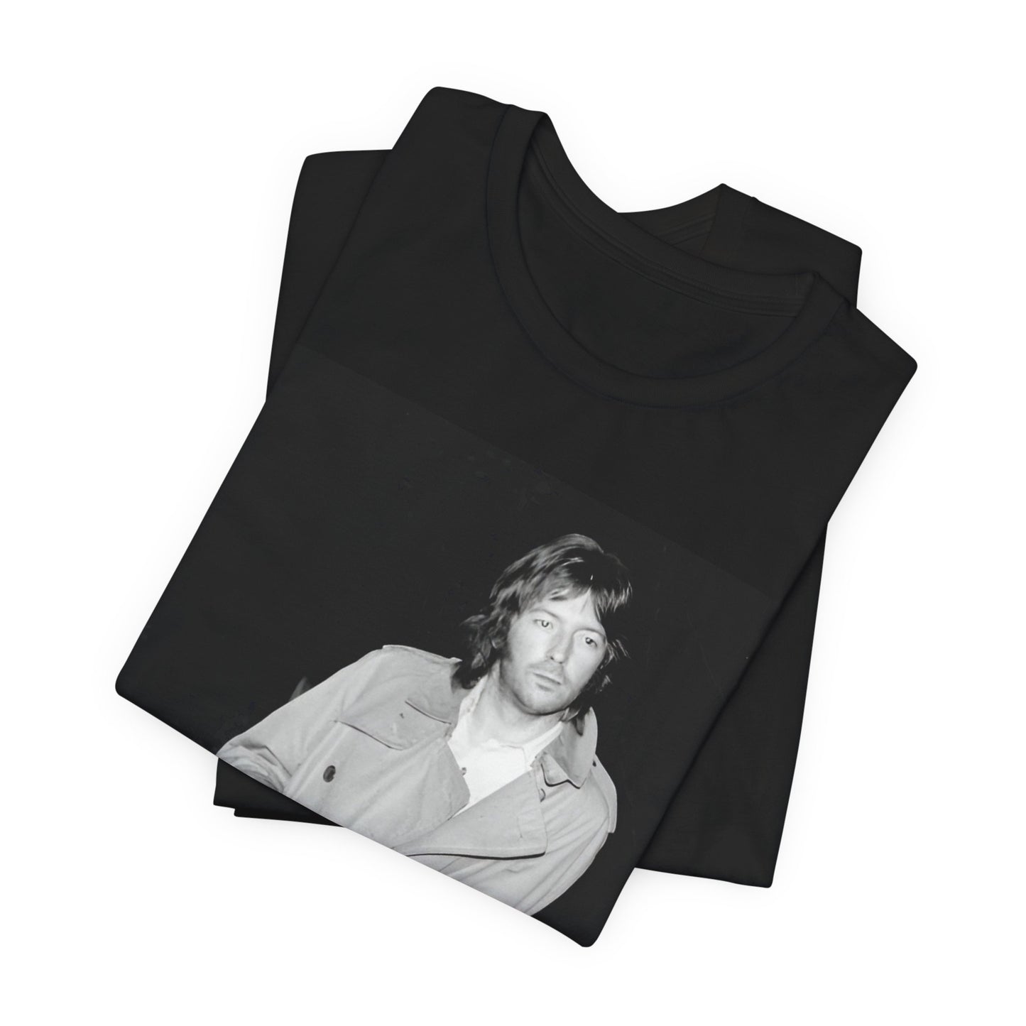 A black graphic t-shirt featuring a retro graphic of Eric Clapton as a blues master.