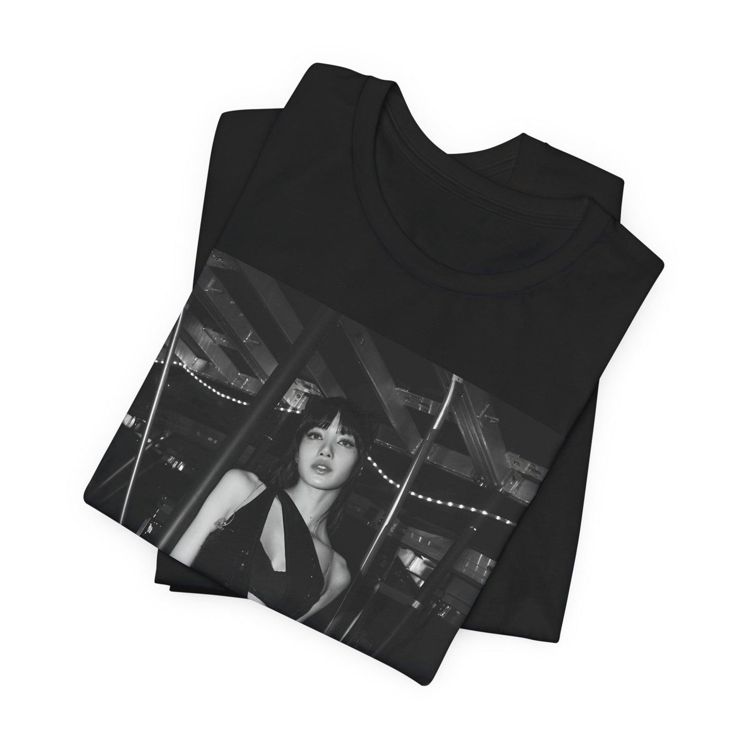 A black graphic t-shirt featuring a black and white graphic or photo of Lisa in a backstage setting.