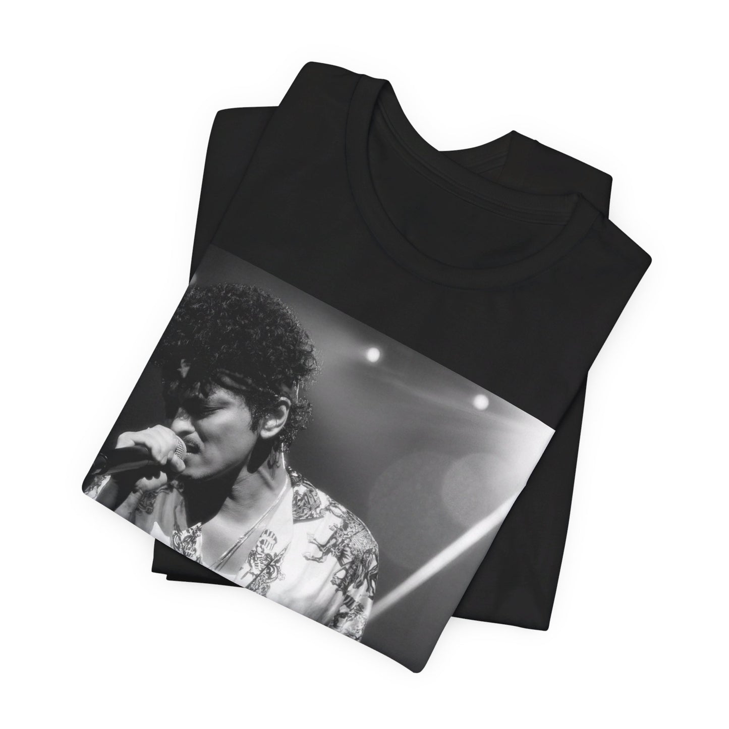 A black graphic t-shirt featuring a retro-style graphic of Bruno Mars as a soul icon.