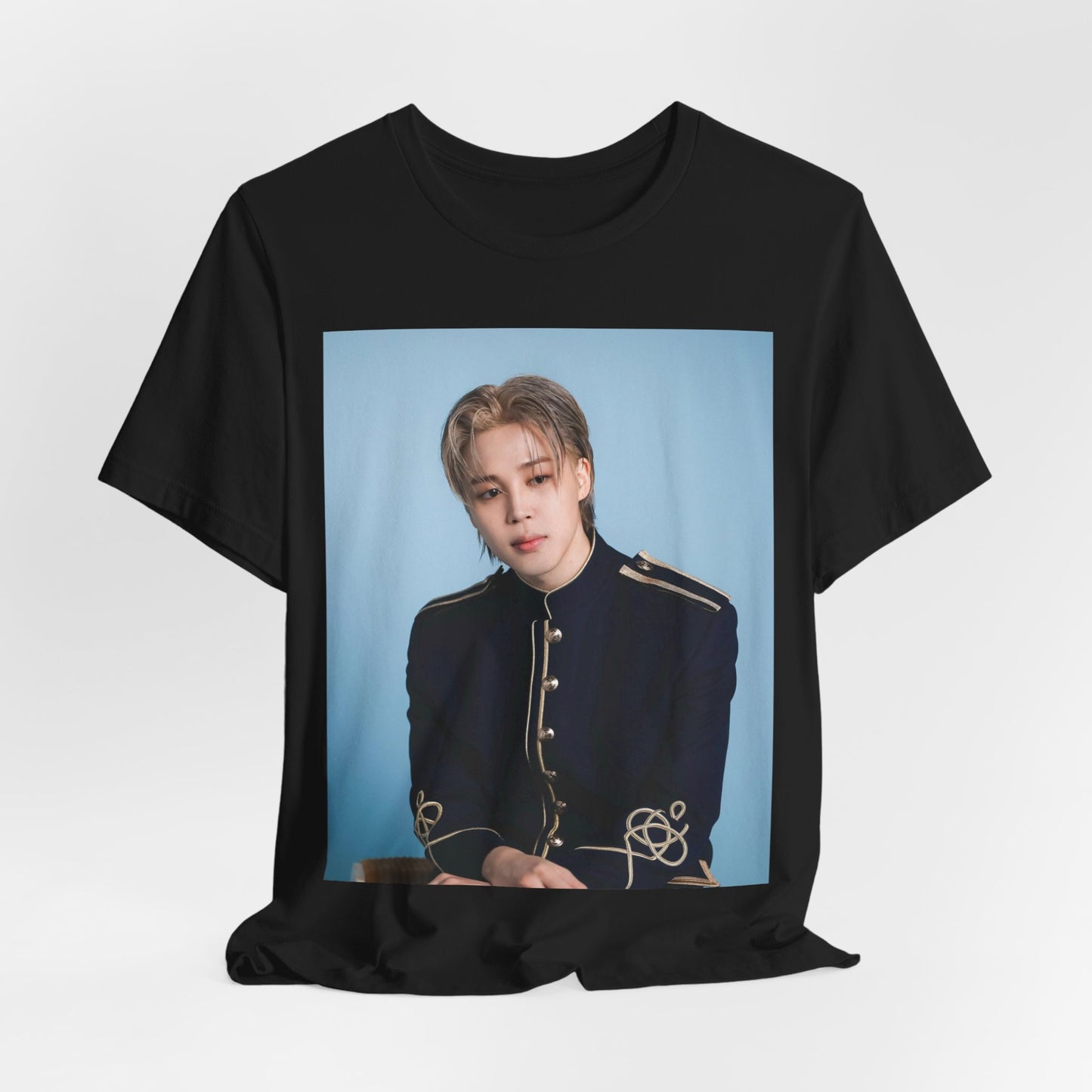 A black graphic t-shirt featuring a graphic related to Jimin's 'FACE' album era.