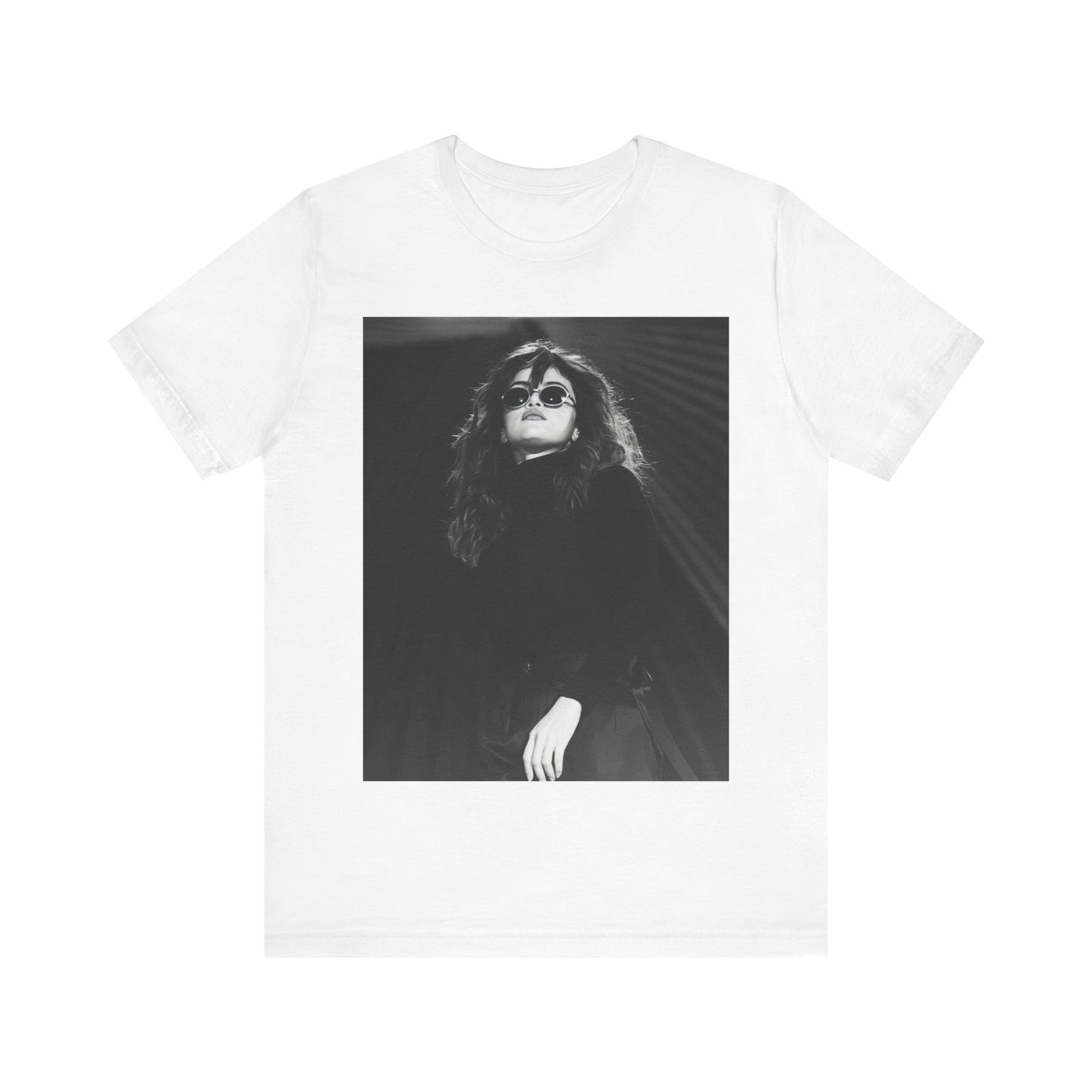 A black graphic t-shirt featuring a black and white, monochrome graphic or photo of Selena Gomez.