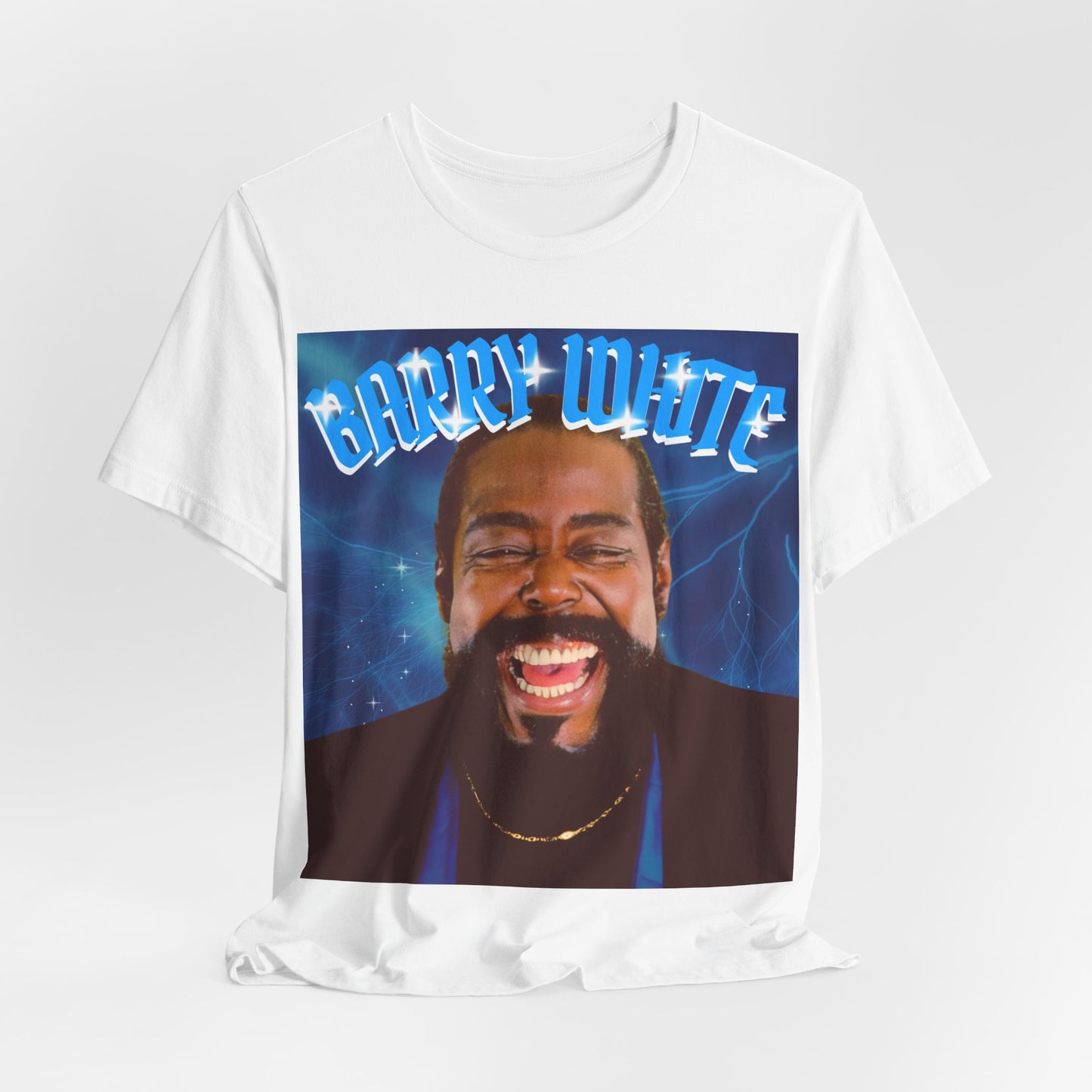 A black graphic t-shirt featuring a vintage 70s-style graphic of Barry White, emphasizing his smooth, iconic look.